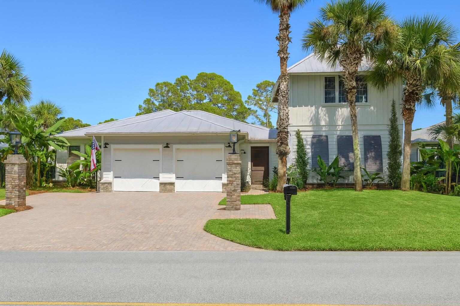 Spacious home off Buck Bayou with private boat house with a lift - large enough to accommodate a 35ft boat plus a jetski lift. Sprawling at just under 4,000 soft this house is perfect for large families - the main house has three bedrooms plus an office and an attached carriage house has a full living room and kitchenette on the main floor and a private bedroom and full bathroom on the second level. Whole-house powered solar panels means your power bill will be next to nothing. Perfect for entertaining, a 45ft deck with a gas fire pit all leads to the water. Hop on your boat or jetski or take a paddle board out in the calm Bayou. Oversized two-car garage with plenty of driveway parking. Separate garage gym with foam flooring for fitness enthusiasts. Minutes from Sacred Heart Hospital.