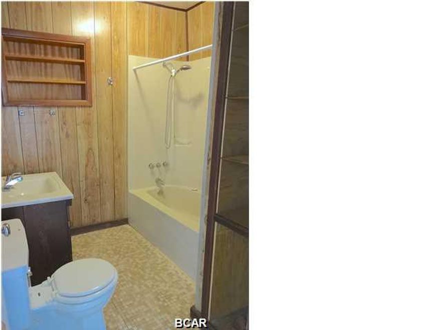 Double lot! you can hook up to sewer and sell the additional lot or build another home! YAHOO! What a great option to have so close to the beach. This is a 2 bedroom 2 bath block home with a garage and an inground pool, This home has a storage shed, and a large enclosed patio! this home is located close to schools, parks, golf courses, Pier Park, airport, Navy Base, etc so you are in an awesome location! This home has been well-maintained and has lots of potential! Whether you want to spruce up the home as your primary residence, use it as an income producing home it is a great opportunity. build your dream home on the lot extra lot. The options go on and on. Don't miss out on this opportunity! Freshly painted!!