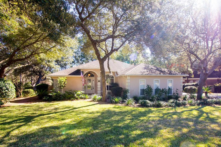 This beautiful Swift Creek home has all the upgrades from high end bosch appliances to plantation shutters, a whole house generator, upgraded light fixtures, security camera system, whole house audio system and 3m Scotch-shield safety and security window film. Open floor plan perfect for entertaining. The spacious guest bedrooms have large walk-in closets. There is a deck out back and plenty of room to put in a private pool. Swift Creek is centrally located in Niceville close to all the local military bases, the college and hospital. In Swift Creek you find sidewalks, a community pool, a clubhouse, walking trails, tennis courts, basketball courts, a park and a lake for fishing.