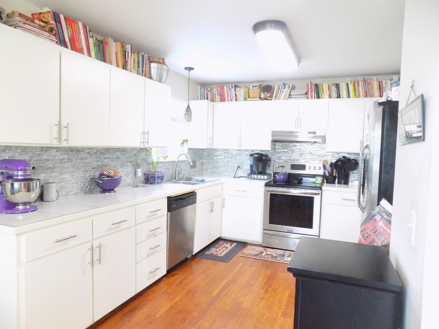 Located just west of the Hurlburt Base this move in ready 3 bedroom 2 bath home is the perfect family home. The galley kitchen has recently been updated with beautiful white cabinets and stainless steel appliances.  The hardwood floors are through out the living areas and master bedroom. The dining area is open to both the kitchen and large family room.  This space is wonderful for entertaining friends and family. The garage has been converted to add extra living space for a 4th bedroom or bonus room for the kids.  The master bedroom is spacious and offers its own private bath.  The other two bedrooms share a hall bath.  The backyard has a large wood deck that is wonderful for large cook-outs or just relaxing in the sun. Easy access to the base and beaches makes this a must see home.