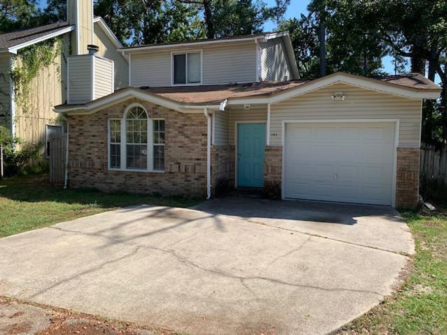 MOTIVATED SELLER! New roof in 2024. Located in a prime spot between both Air Force bases and close to hospitals and medical facilities, this well-maintained two-story home offers comfort, convenience, and privacy. The home features a desirable split floor plan, with the master bedroom and full bath located on the main level, and two additional bedrooms upstairs--perfect for families or guests. Enjoy the peace of a quiet cul-de-sac and the security of a fully fenced backyard, ideal for entertaining, kids, or pets. Don't miss out on this ideal location and functional layout--perfect for military, medical professionals, or anyone seeking a central location in North Fort Walton Beach!