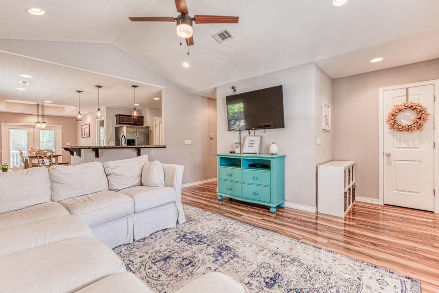 Welcome to the desired neighborhood of Water Oaks! Built by local builder, Darrell Miller, this home features 3bd/2ba, an upgraded kitchen including granite counter tops and stainless steel appliances. Enter through the front door and see an open concept lined with beautiful laminate hardwood floors. The master bedroom is located at the back of the home while the 2 additional bedrooms and bathroom is down the hallway, where the laundry room is also located. The backyard, although small, is quite shaded with pine trees and has lovely deck to enjoy quiet mornings. This home is a very short drive to beach accesses, shops and restaurants, making it the perfect location. Audio and visual cameras are in the property.