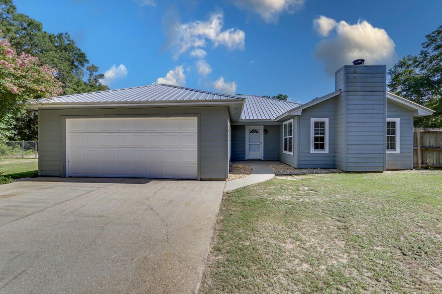 This house located on 2.29 private acres is nearly 2500 square feet with 3 bedrooms, 2 bathrooms and 2 large separate living areas.  This home also has a large eat-in kitchen with details such as hard-wood flooring, granite countertops and seemingly miles of cabinet space.  Outside, the more than 2 acres are fenced in, with large mature trees and plants for more privacy.  Need a workshop? Well, there is one and it has power.  This place is a gem for under $380k.  Please consider this house for your next home!