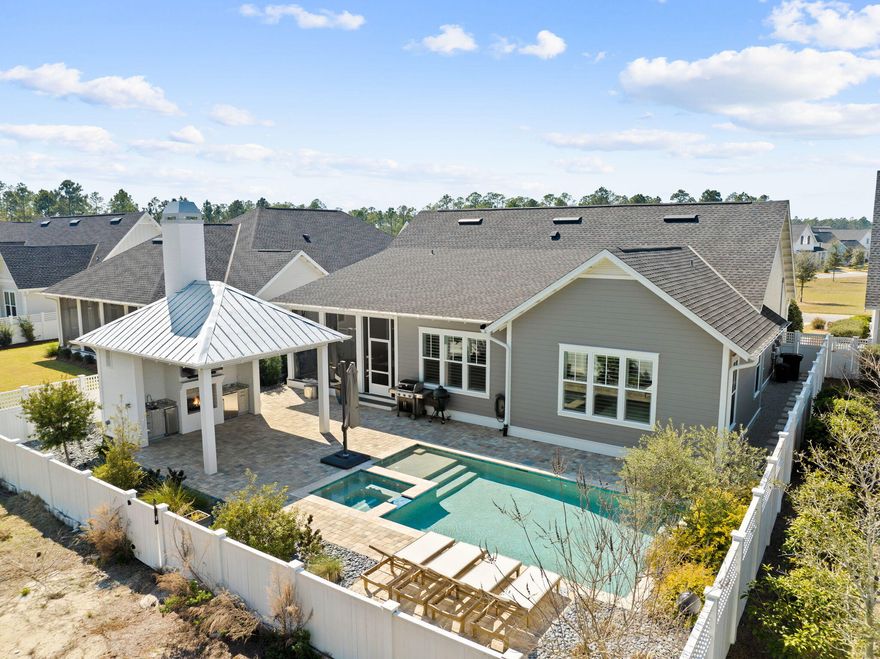 Tucked away on a quiet, five-home street in the sought-after Stillwater phase of Watersound Origins, this stunning one-level, 2020-built Huff Home is the perfect blend of luxury and tranquility. Sitting on a spacious lot with a private wooded preserve in the back and a charming community park in the front, this highly upgraded Gardenia plan offers 2,770 sq. ft. of thoughtfully designed living space, featuring 4 oversized bedrooms, a dedicated office, and 3.5 beautifully appointed bathrooms. From the moment you step inside, you'll notice the meticulous attention to detail--10' ceilings, 8' doors, custom crown molding, and shiplap accents create an inviting coastal elegance. The gourmet kitchen is a showstopper with floor-to-ceiling cabinetry, granite countertops, and Bosch stainless steel appliances, including a vent hood and a sleek Sharp drawer microwave.
Each bedroom is generously sized to accommodate a king bed, and the spa-like bathrooms feature designer tile and custom-built closet systems. The primary suite is a true retreat, offering a peaceful escape with an en-suite bath designed for relaxation.

Step outside to your private backyard oasisa heated Gunite/Pebble Tech pool and spa sit within an expansive paver patio, all framed by lush landscaping and a privacy fence. A new addition is this stunning outdoor cabana with a gas fireplace, ice maker, private bathroom, and added storage.

Twinkling lights and landscape lighting enhance the ambiance, while an iPhone-controlled pool and spa system ensures effortless enjoyment. Smart home features include a whole-house generator (24KW), alarm system, and Culligan water filtration. A large screened-in porch adds even more space for outdoor living.

Watersound Origins offers an unparalleled coastal lifestyle with access to a state-of-the-art fitness center, seasonally heated community pool, Lake Powell dock access with community kayaks and canoes, an executive golf course, tennis & pickleball courts, and miles of scenic trails. For the ultimate beach experience, owners can join the St. Joe Beach Club, unlocking private beach access, multiple pools, Gulf-front dining, and exclusive golf courses (Camp Creek, Watersound III & Shark's Tooth).

Ideally located just minutes from the new Publix town center, Scenic Highway 30A's top restaurants, boutiques, and year-round events, this one-of-a-kind property offers a rare opportunity for resort-style living in a prime location.