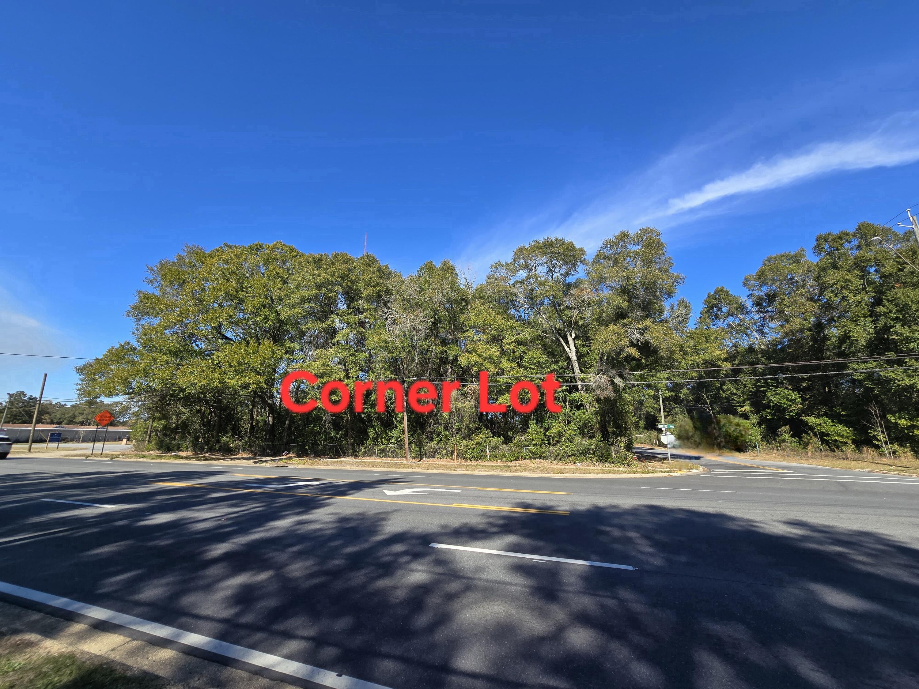 BEAUTIFUL COMMERCIAL CORNER LOT IN CRESTVIEW, FL.!!! OVER HALF ACRE, WITH 150' FRONTAGE ON US HWY. 90 W. IDEALLY LOCATED AT JUST A FEW BLOCKS FROM DOWNTOWN CRESTVIEW AND THE BUSY HWY. 85 N. CONVENIENT FOR RETAIL OR OFFICE BUILDING . DON'T MISS THIS OPPORTUNITY!