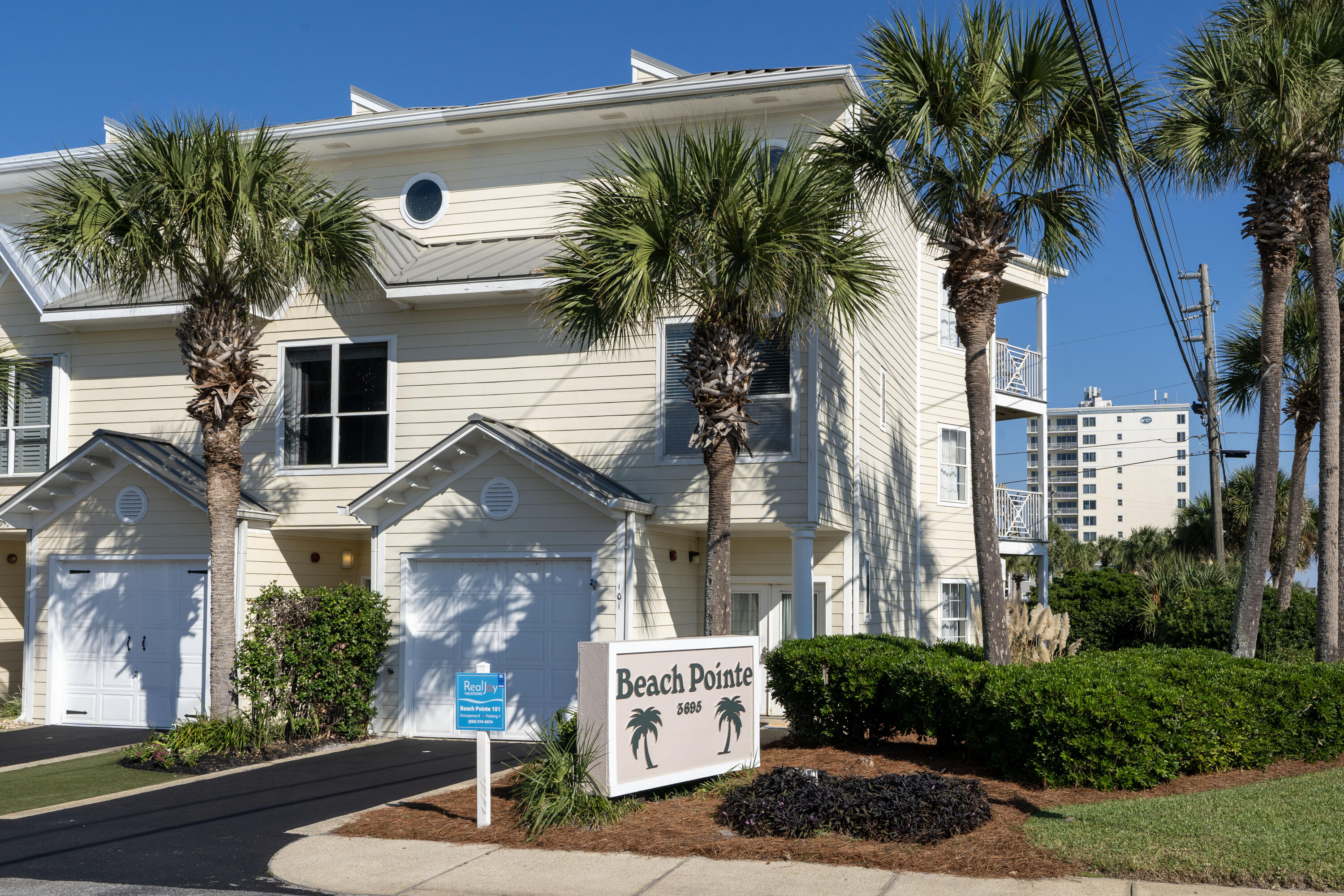 This is a  gulf view & end unit townhome with the view facing east  providing unobstructed views of the Gulf of Mexico  and sunrises every morning . Directly across the street from the gate and deeded beach access for Beach Pointe homeowners and guest.  Unobstructed  gulf view from second and third floor balconies and also from inside the second floor living room, kitchen/dining. There is one bedroom and full bathroom on each floor. The first floor bedroom has access to back patio and green space.  Entire 3rd floor is the large master suite with the master bedroom porch facing east waking up to some of the prettiest sunrises on the beach.   1 car garage. LVT flooring throughout the home 4 yrs old.  New 3rd floor air conditioner. Seller is giving a $10,000. painting allowance at closing.  This unit has been on the vacation rental program for 15 years and has many repeat guest who come every year. 