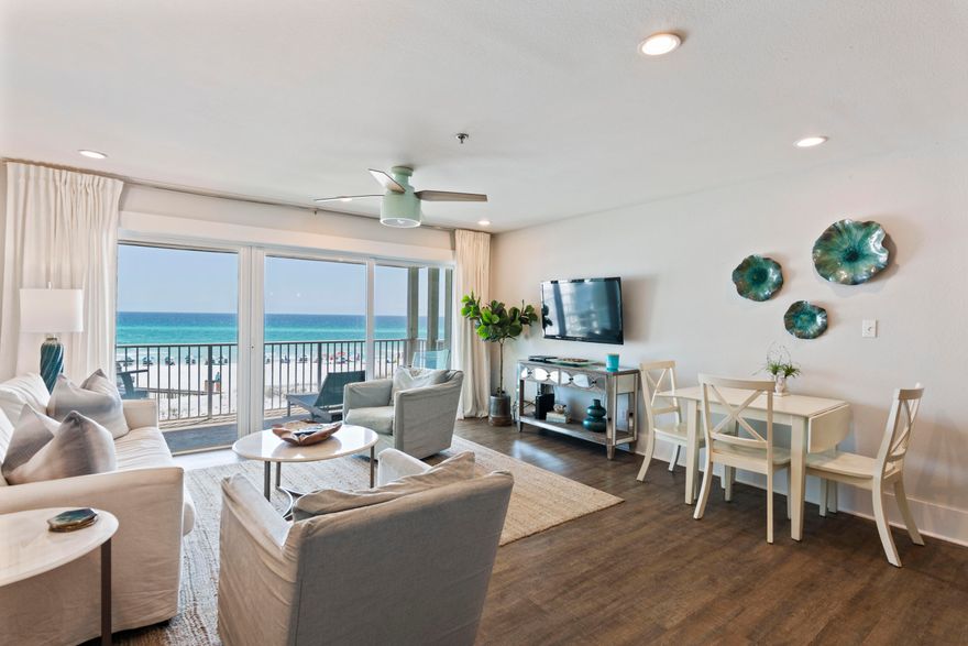 Gorgeous totally renovated condo with expansive views of the Gulf and Eastern Lake outflow. This second floor gulf front condo (with elevator) offers a one of a kind location tucked away in Seagrove Beach. The unit has been completely renovated and professionally decorated in a comfortable coastal chic style. The layout includes a spacious master bedroom plus built-in bunks in the hall.  The living room, kitchen, and dining area have stunning views of the Gulf with sliding glass door entry to private deck. This condo can sleep up to 6 people with King size bed, twin bunks in hallway, and queen size sleep sofa in living room. Other notable property features include covered parking under building, community pool, grilling area, exterior storage closet, and private secured beach access. This