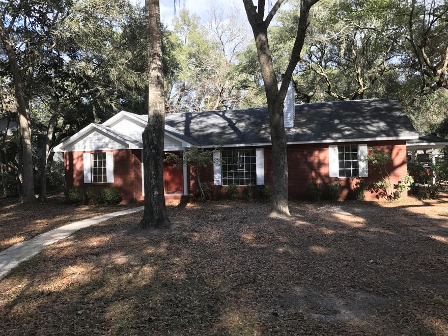 Lowest priced home in Waterview Cove that also has some recent renovations on an amazing oversized double lot with large mature trees and plenty of space for the family! The owners just had the house painted throughout the interior and the home is move in ready today. The carpets have been cleaned since these photos were taken. This is a split floor plan with two master bedrooms and two additional bedrooms. The eat in kitchen overlooks the covered back patio and HUGE back yard, so great for entertaining or grilling on the weekends with the family! Schedule your showing today!