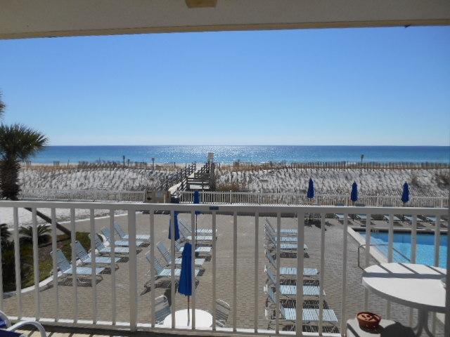 Gulf Beach Front views from Balcony, Master bedroom, Dining and living Area! in this nicely decorated 2 bedroom Condo. Come see recent upgrades furnishings, light fixtures, window coverings, Stove, Flat screen TVs with DVD players. New HVAC system in 2010. Sea Oats location is real close to the Restaurants and Pier for just a short walk, plus Beach side Pool, Jacuzzi room, exercise room, tennis court and BBQ area. Make this you destination Vacation Home or Investment! PER ON Site Management Owner used Unit extensively in Summer months so Unit Income LOW compare to Potential Income 2014 Unit $17,500 / Other Units $23-31,000 2013 Unit $15,000 / Other Units Average 26,0000