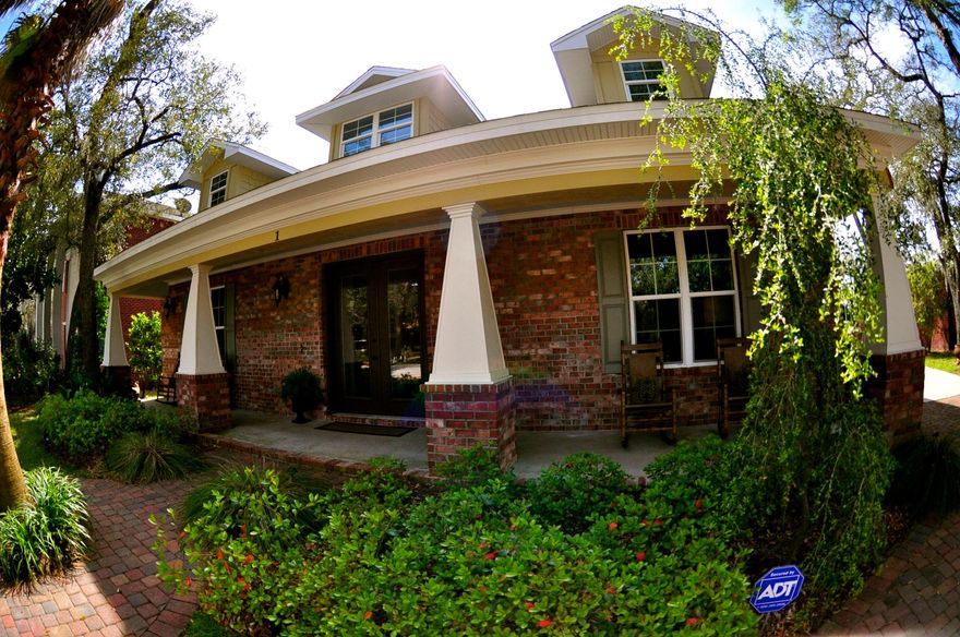 This home was 1ST PLACE WINNER of 2010 in its category in the 2010 Parade of Homes. Absolutely beautiful, true Southern decor with 12 ft ceilings, custom upgraded cabinetry, granite countertops, Brazilian hand-scraped hardwood flooring and stainless appliances (including a commercial-grade built-in refrigerator/freezer and Frigidaire Gallery Series gas stove). Master suite is oversized and has a tray ceiling and large walk-in closet. The master bath is beautiful with custom cabinetry, whirlpool tub, separate shower, double vanity,& linen closet. Home has TAEXX ''in the wall'' pest control system that is serviced from the exterior of the home. Home has complete central vacuum system. This neighborhood, laden with mature oaks and magnolias, is a rare find in town, and has WATER ACCESS!