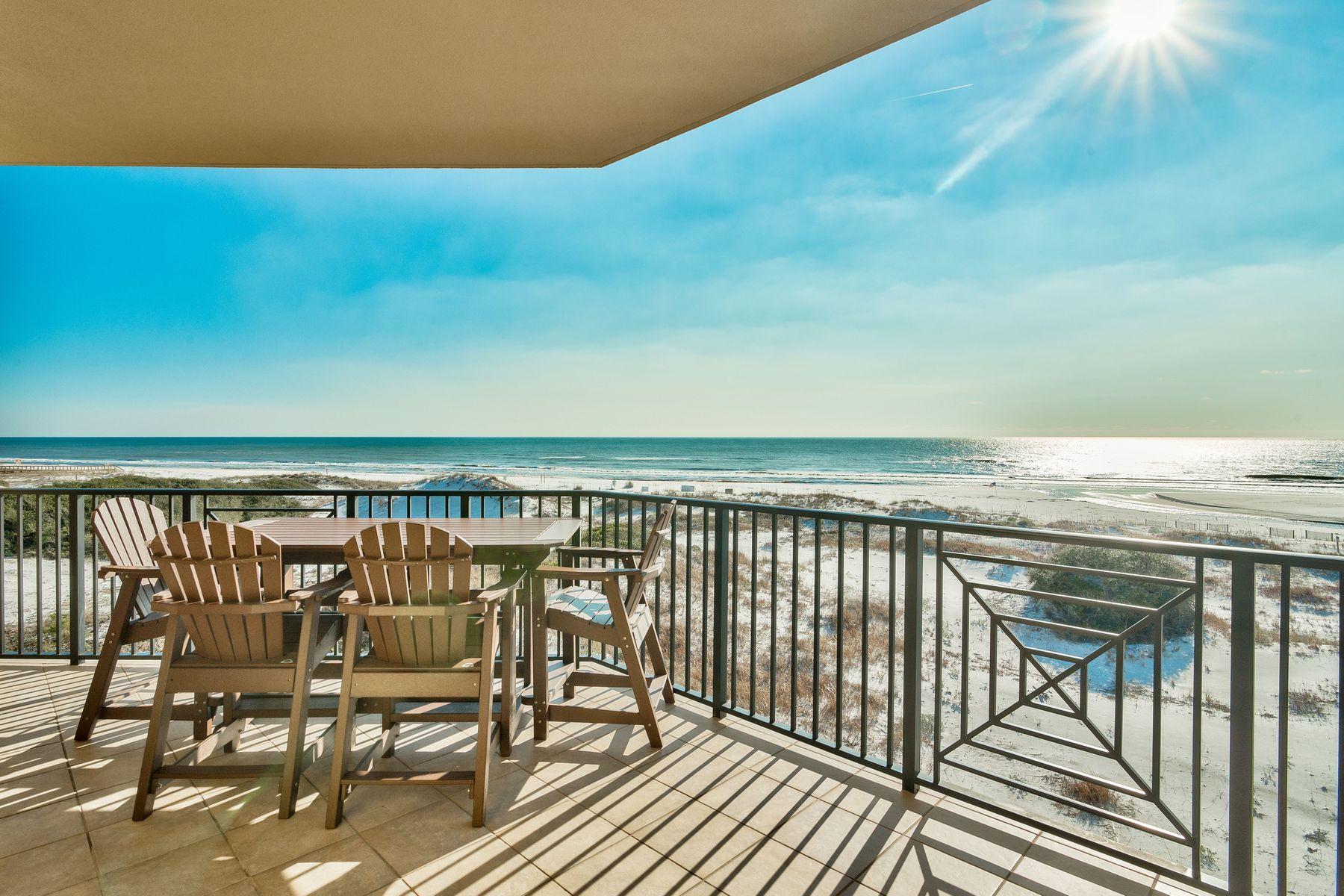 Gaze out across undulating dunes to the sparkling Gulf of Mexico or enjoy uninterrupted lake views from your own private balcony with this luxury condo at Sanctuary by the Sea. 1500 feet of frontage on Big Redfish Lake and 650 feet of beach on the Gulf of Mexico are just some of the priceless features that owners can look forward to. This high-end beach home lives large with a bonus room/office plus a media room currently furnished with three beds. This elegant condo is bright and spacious, from the airy 10-foot ceilings with crown molding to rich travertine floors gracing the living room. Note the corner feature fireplace and the handy wet bar - perfect for mixing sunset cocktails.The well-planned kitchen is generous, with rich granite countertops and a range of cabinets and appliance