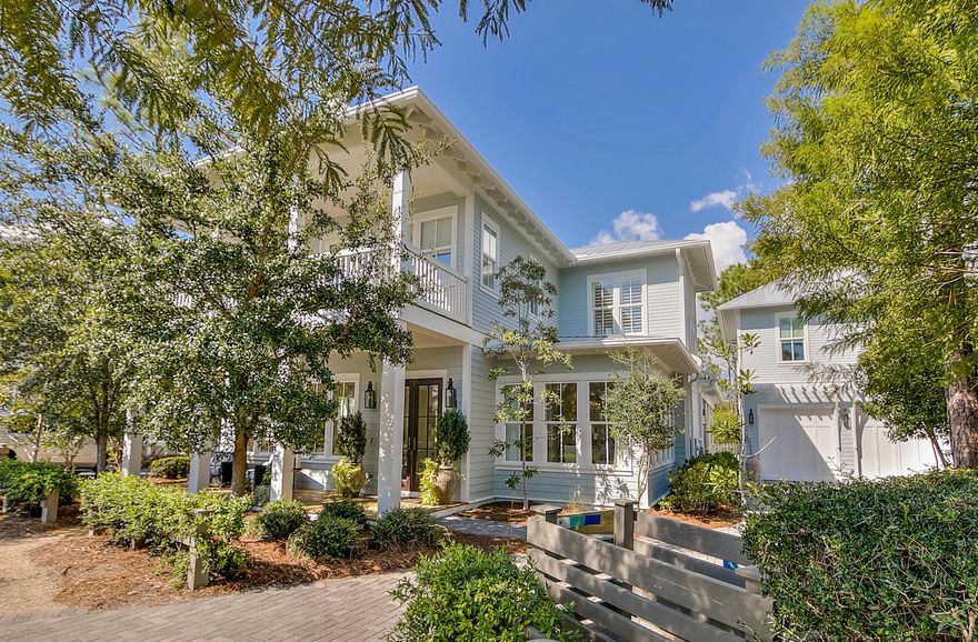 Stunning & elegant home in popular Phase IV of WaterColor. This incredible home with outstanding designer selected interiors is perfect for full time living. The main house features 4 bedrooms, large private office, master suite with expanded walk in closet, built in side grilling porch with gas & charcoal options, mud room with custom cabinetry, custom wine cellar, and a massive L-shaped screened in porch with sitting area and dining area. The carriage house features a spacious bedroom/living area, private bath, & kitchenette. The oversized 2-car garage is a real bonus as is the driveway that can accommodate up to 4 additional vehicles.The lot that this home is built on is one of the larger lots in Phase IV and backs up to a nature preserve area and is bordered on one side by a