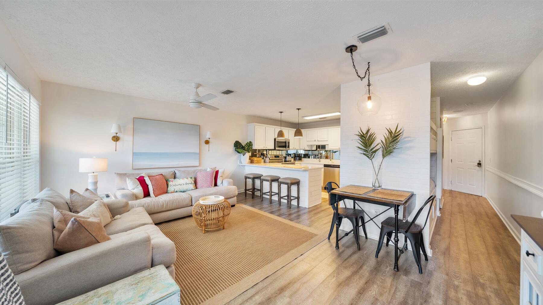 Welcome to a STELLAR investment property that generated $25,000+ in actual rental income last year! This charming 770-square-foot ground floor condo offers a unique blend of modern beach design and convenient amenities, making it an ideal investment or personal retreat, located across from the beach. You will not find a better investment at this price with PROVEN RENTAL HISTORY!This one-bedroom, one-bathroom unit at Horizon South has been completely renovated to feature a chic, modern beach aesthetic and is in the building closest to the gated entry by the beach. You will be from your front door to the sand in just 325 steps! The bedroom includes a King size bed and is just off the main entrance. The hallway offered spacious bunk beds for additional guests or children. The Jack and Jill bathroom design provides a vanity accessible from both the hallway for guests and the bedroom, ensuring convenience and privacy.
The spacious living and kitchen area is designed for comfort and functionality, featuring a large kitchen island and new quartz countertops. The open layout creates an inviting space for entertaining or relaxing after a day at the beach. Step outside to the adorable covered porch, where you can enjoy serene lake views, offering a peaceful retreat.
Recent improvements on this property include new patio furniture, new water heater, new Quartz countertops, new WiFi enabled keyless door handle with new Arlo doorbell camera and new bedroom TV. Other improvements include modern shiplap clad accents throughout, light fixtures, plumbing fixtures, living room fan, Ecobee thermostat, Google Nest WiFi camera, blinds, bedding, furnishings and decor. With last years rental revenue at $25,000+ and room to grow, you'll be set with this condo already having $9,000+ on the books for 2025.
Located directly across from the beach, this property allows you to enjoy the sand and surf just steps from your door. The vibrant location is walkable to a variety of restaurants and shopping, providing endless entertainment options.
As part of the Horizon South community, residents have access to incredible amenities, including multiple pools, hot tubs, a newly renovated fitness center, shuffleboard, tennis/pickleball and miniature golf. The gated community ensures security and peace of mind. This property also boasts a remarkable rental history, making it a lucrative investment opportunity.
Experience the best of Panama City Beach living across from the beach!