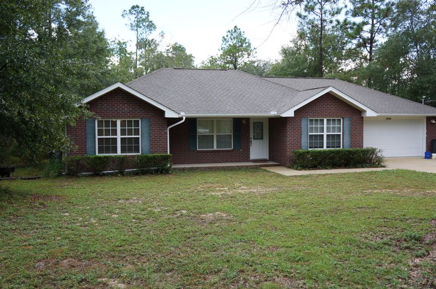 All Brick Home on Large Acre Lot... 3 Bedroom, 2 Baths, features vaulted ceilings in living room and dining room, tile throughout the kitchen and bathrooms, split bedroom floor plan. Great location; country feel yet close to downtown and easy commute the bases.