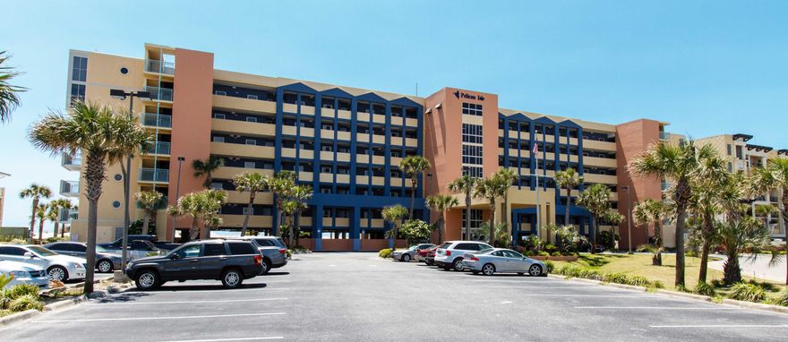 This floor plan has the Master bedroom on the beach! Covered parking space conveys. Excellent rental property. This two-bedroom, two-bath condominium is located at Pelican Isle on Okaloosa Island, Fort Walton Beach, Florida. This Pelican Isle unit is located on the fifth floor and will sleep eight people comfortably. Both the living room and master bedroom face the gulf allowing you unobstructed views of the gulf and white sandy beaches. The two bedrooms, living room, and both bunk beds have a TV and DVD player. The living room has a 60 inch plasma TV, the master bedroom has a 42 inch plasma TV, and second bedroom has a 42 inch LCD TV. Included is FREE HIGH-SPEED wireless INTERNET. Heat pump replaced in December 2013.