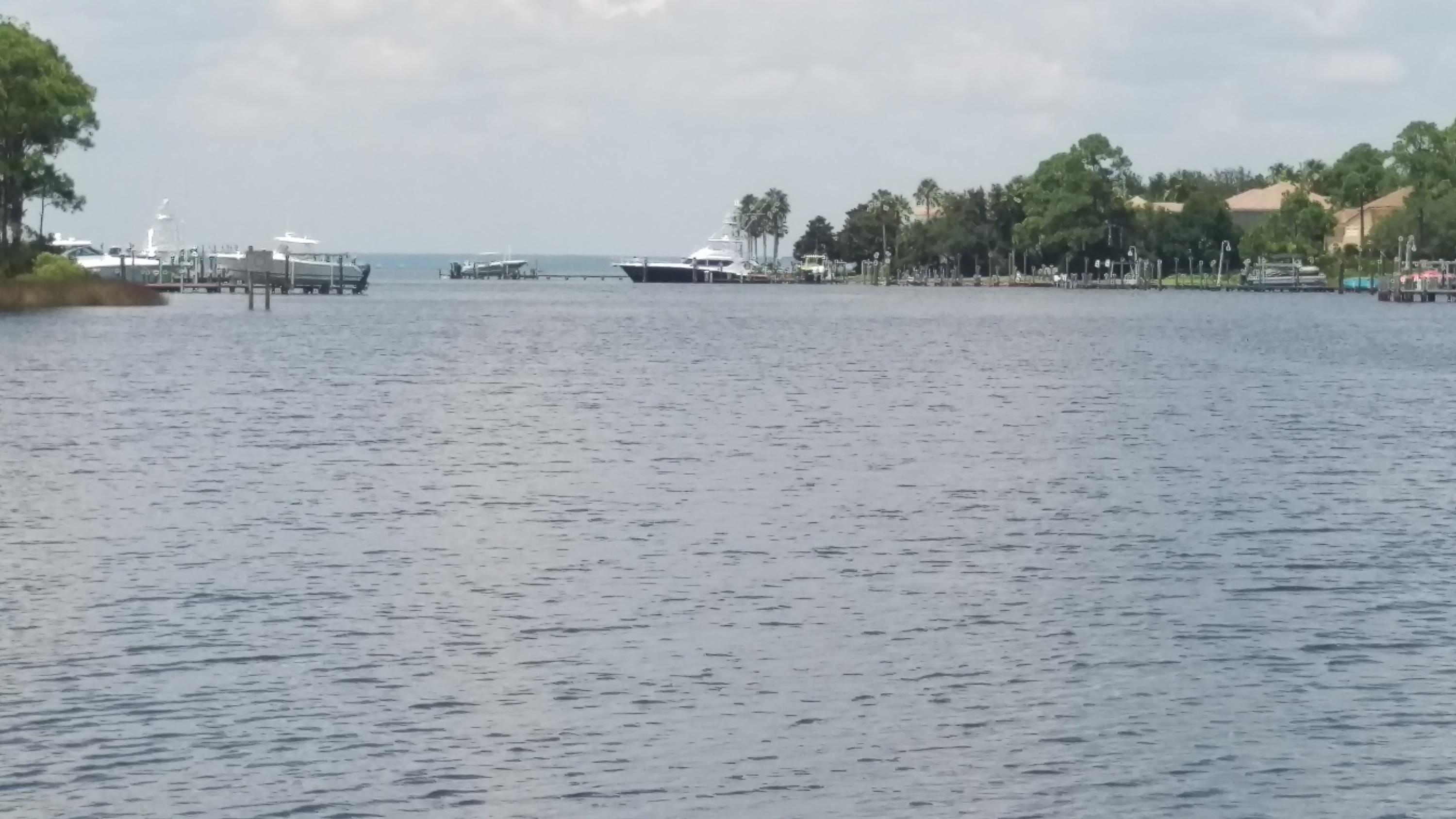 This stunning 3 bed/3 bath waterfront home has everything you need to get the best of Destin. Located in a quiet neighborhood in Indian Bayou, this home gets you away from the crowds and provides easy access to the bayou.Pulling in, you're greeted by beautiful trees that perfectly shade the property, helping to keep the temperature down and giving you a little more privacy within the home.Features:The home features a spacious two car garage and additional room for boat parking. The floor plan is open to highlight the spaciousness of the property. Windows are perfectly placed throughout the house to let in the natural sunlight and beautiful views of the bayou. The home has tile and wood flooring throughout. The living room and kitchen/breakfast nook both keep you cozy and warm duri