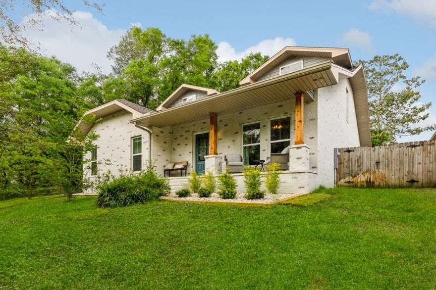 Welcome home! When you pull up to this home you will notice the beautiful German smear, cedar wrapped pillars, a front porch and new landscaping. Upon entering the foyer you will see the formal dining room on the right. Continuing down the hall, you will be greeted by the kitchen, living room and dining area. The kitchen features a wrap around breakfast bar, granite counters and stainless appliances including a HUGE refrigerator/freezer. Don't forget about the coffee bar connecting the kitchen and formal dining area.The OVERSIZED master suite on the first level features a bath with a soaking tub, separate shower, dual sink vanity and walk in closet with custom shelving. Upstairs there are the other three bedrooms and in one of the bedrooms it has a private full bathroom.