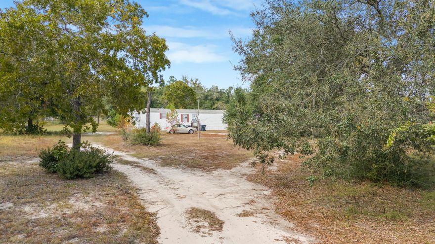 2.28-Acre Homestead or Income Opportunity - DeFuniak Springs, FLEmbrace the peaceful charm of North Florida living on this combined 2.28 acres of land, perfectly zoned General Agriculture and full of potential for a homestead, rental investment, or multi-family retreat.This offering includes two separate 1.14-acre parcels, being sold together:One parcel features a 3-bedroom, 1-bath mobile home currently tenant-occupied, generating a projected rental income of $1,100/month--an excellent opportunity for instant cash flow.The second parcel has water access and an old brick building in the back. 2.28-Acre Homestead or Income Opportunity - DeFuniak Springs, FL

Embrace the peaceful charm of North Florida living on this combined 2.28 acres of land, perfectly zoned General Agriculture and full of potential for a homestead, rental investment, or multi-family retreat.

This offering includes two separate 1.14-acre parcels, being sold together:

One parcel features a 3-bedroom, 1-bath mobile home currently tenant-occupied, generating a projected rental income of $1,100/month an excellent opportunity for instant cash flow.

The second parcel has water access and an old brick building in the back.

Both properties have utilities on site and plenty of open space for expansion, gardens, animals, or additional dwellings. The land is high and dry with beautiful natural surroundings and the freedom that comes with agricultural zoning.

Located just 35 minutes from the white-sand beaches, Eglin Air Force Base, and local shops and dining, you'll enjoy country living without sacrificing convenience.