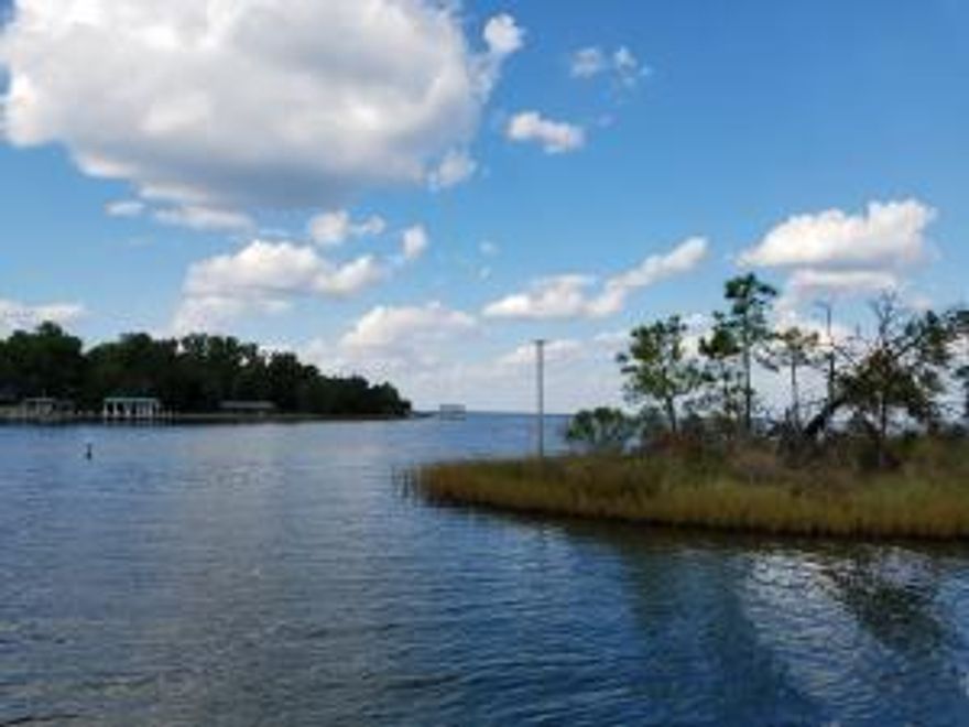 The salt life on the water with breathtaking views of the Choctawhatchee bay and Mack Bayou. Can you imagine waking up to dolphins swimming in your back yard? Jumping in your boat and taking a cruise to your favorite restaurant. Enjoying the sunset from your living room on the water. Imagine how this will change your life. This lot includes a check list of must haves. Sea wall ,Raised elevation,Slip/Dock , All water/sewage/cable on lot hook up tap fees payed for sewage,Paved road ,Gated community and the lifestyle you're looking for. Let's do the math, you save a minimum of $10,000,00 for each included item. That's $60,000 ''included''. See additional Lots and combine your purchased in group. Deep water access. Arboleda Estates community is located only 5 miles to 30A beach access