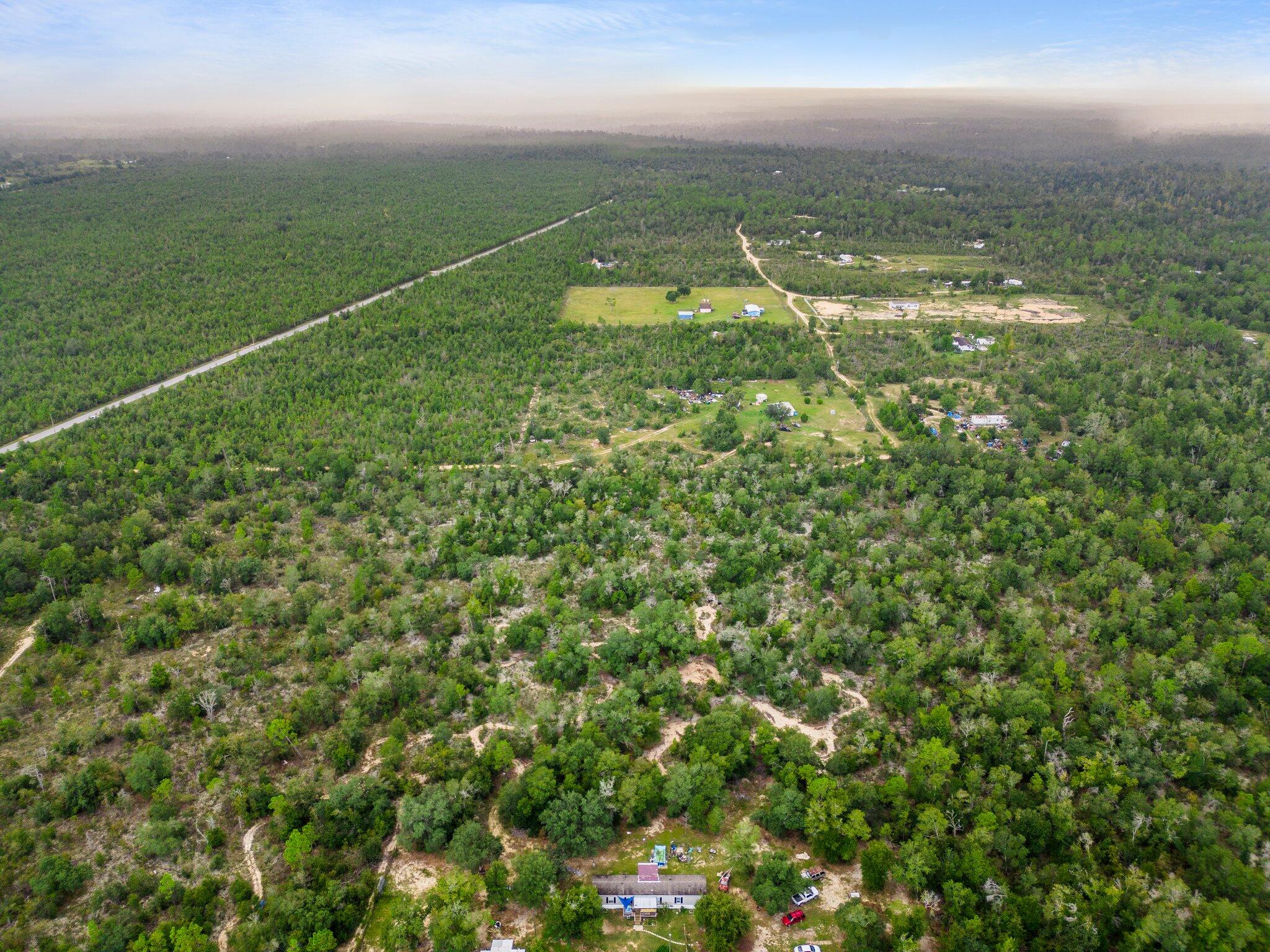 Create your dream home or investment opportunity on this sprawling 10-acre parcel off Highway 231 in Fountain, Florida. Whether you're ready to build now or hold for future development, this property offers endless possibilities. Utilities are not currently installed; a water well and septic system will be needed. Access is available via Holly Road. Don't miss this chance to own a slice of Florida's countryside!