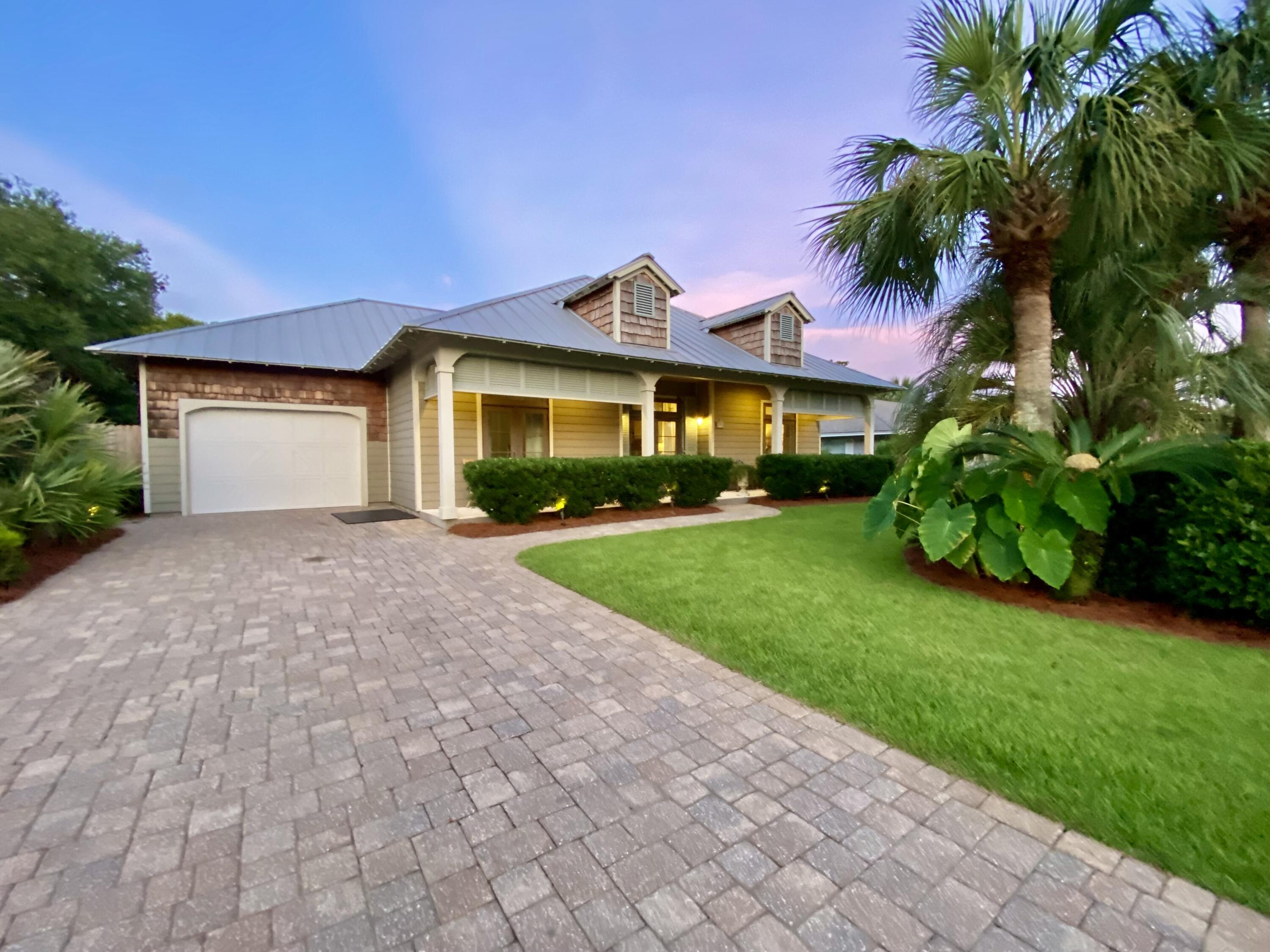 Exquisite custom home in Santa Monica Beach (West of Panama City Beach), the coveted West End community with no thru traffic and a private gated beach entrance & $120/annual HOA. With no detail overlooked, the Chef's Kitchen features Viking Professional Appliances, Granite Tops, Walk-in Pantry, plentiful Custom Cabinetry, and Reverse Osmosis drinking/cooking water, and screened-in porch with wood burning Fireplace, which overlooks the Private Saltwater Pool. The living room, with soaring 17' vaulted ceilings and gas fireplace, offers views to the back yard oasis with mature, low maintenance landscaping. A bonus space, overlooking the pool, can be used as a spa room, studio, or office. The primary bedroom with ensuite bath opens to screened porch/pool area with fireplace. MORE..... The primary bath features include a custom dual vanity with Carrera Marble top, Walk-in shower, and plumbing for bidet reinstallation, if so desired. 10' Ceilings throughout and 17' pine with cedar beam vaulted living room ceiling. All bedrooms and living areas have french doors that open to covered patios. Solid core 8' interior doors; James Hardie siding; hurricane rated Andersen Windows & Door; tankless Rinnai water heater, for endless hot water, and an attached garage. Driveway, walkways, pool deck, & backyard are constructed of pavers. Next to the Pool is a private Outdoor Shower and room for extra storage. For added convenience there is a huge underground Propane Tank, with grill connection, comprehensive Irrigation System, and Security System..
140 Belaire is a custom residential project built by Anderson Construction, top quality Master Builder.