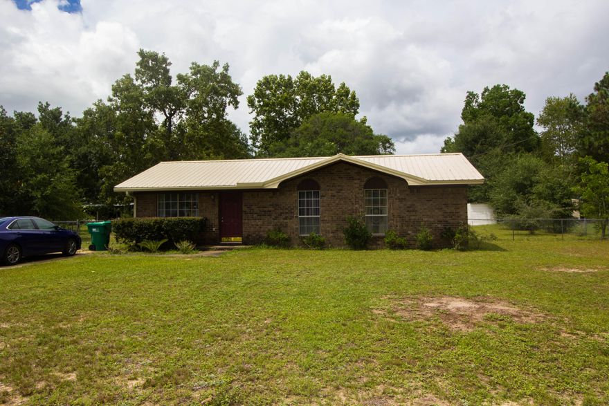 3 bedroom 1 bath all brick home located in North Crestview. Home has had a new metal roof and HVAC system installed in the last 5 years. Spacious fenced in backyard allows for the kids and family dog to play safely. Interior of the home has been refreshed with paint and new flooring including tile and laminate. Schedule your showing today!!!Updated Pictures coming soon