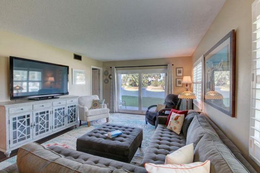 Welcome to El Matador 519! This convenient, ground floor, end unit features large windows that bring in natural light throughout the living, dining, and kitchen areas.  This unique end of building location also allows for extra outside space.  The patio and grassy areas are framed by a white fence giving you the feeling of having your own private yard with palm trees!  Follow the grass a few more steps and you are at the basketball court, tennis court,  exercise gym, clubhouse, or heated pool.   Take another short stroll and you will come to large pool, gazebo, and beautiful white sandy beach on the Gulf of Mexico!  This unit works well for families with so many great amenities and something fun to do for everyone in the family.