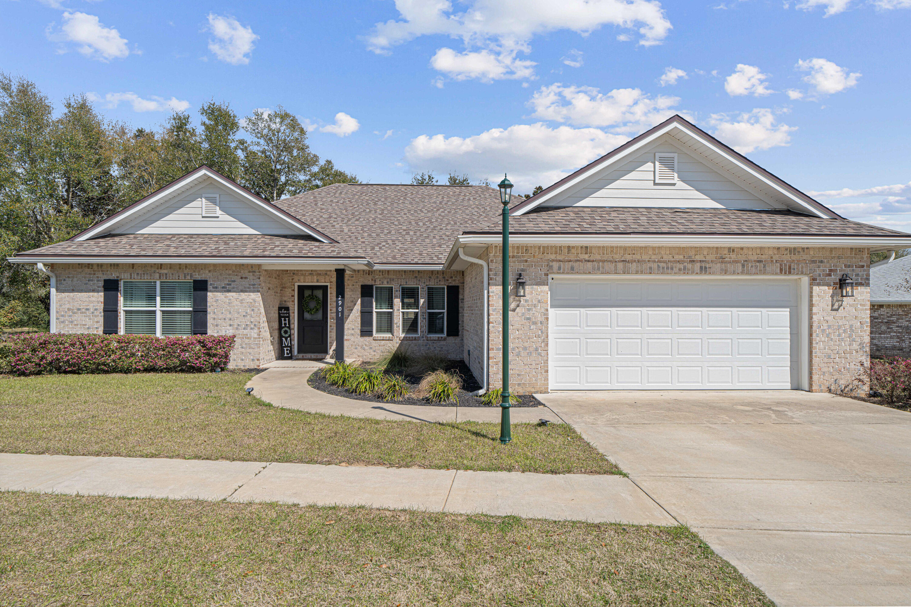 ** VA Assumable 2.25% interest rate. ** This 4-bedroom, 2-bath home, spanning 2,206 sqft, is well maintained and designed for both entertainment and relaxation. Nestled in one of the most sought-after gated communities in South Crestview, it offers a welcoming, open split floor plan, ideal for modern living. Inside, you'll find stunning LVP flooring, sleek countertops, and stainless steel appliances. The spacious primary bath is a serene retreat, and the outdoor living space, including a screened-in porch, provides year-round enjoyment. You'll love the lush Lemon and Key-lime trees, which line the walkway leading to the community green space. This home is equipped with a sprinkler system, full gutters, and recently sodded grass--just under a year old--for easy upkeep.