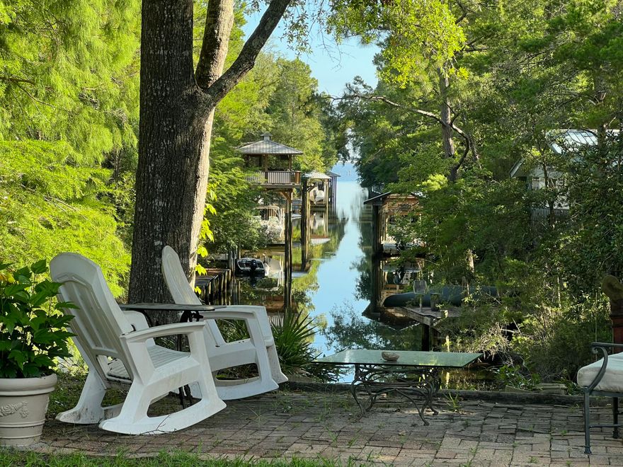 Rare opportunity to build in a charming coastal community in Santa Rosa beach. This beautiful homesite is shaded by stunning mature live oaks and located in a quiet neighborhood with NO HOA. The lot overlooks a canal and is just yards from the bay, offering breathtaking sunset views and easy water access. The brand new dock has been recently built, perfect for boating, kayaking or paddle boarding and exploring Choctawhatchee Bay. Enjoy peaceful coastal living just minutes from the white sandy beaches along the Gulf of Mexico. Nearby shops and restaurants. Ideal for building a primary residence, vacation home, or investment property.