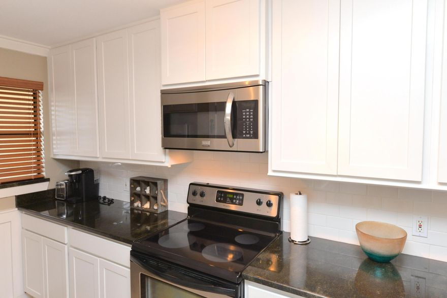 EVERYONE LOVES A MAKEOVER  totally remodeled two bedroom, two & a half bath townhouse approximately 130 yards from the beach! From the minute you walk in you will feel the coastal vibes. The townhouse features spacious living/dining area which opens to the top-notch kitchen with granite countertops, stylish backsplash, stainless steel appliances, beautiful cabinetry, & breakfast bar. There is a full-size washer & dryer which is only two years old. Upstairs houses two nice-sized bedrooms with private baths. Other features of this fully-furnished unit include an upstairs balcony off the master bedroom, a fenced patio, a storage room, two-year-old AC & hot water heater, & best of all NO ASSOCIATION FEES. Even though this unit has not been rented since the present owners have owned