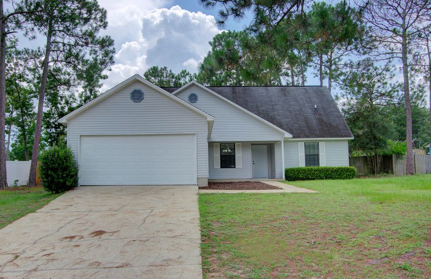 FULLY RENOVATED! From cabinets, to countertops and vanities, flooring to fixtures, even appliances, smart switches, and HVAC. Enjoy a renovated home in South Crestview! This welcoming 4 bedroom home offers a bonus room and 2.5 baths. Brand new LVP flooring on the first level and plush new carpeting on the second. A pleasing neutral color palate designed with beautiful ceiling fans throughout. The kitchen is tastefully updated with new cabinetry, a charming backsplash, and a welcoming open floor plan. An updated fireplace creates a welcoming and spacious living room. Lots of room to play, with a spacious fenced in backyard and a 2-car garage. No HOA fees, located south of I-10 with Air Force bases and 7th Group nearby.