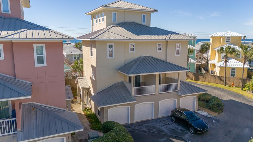 GULF VIEWS, Across from the Beach...under $1M?! YES! Panoramic Gulf views from nearly every window and direct access to pristine white-sand beaches. Updated with high-end finishes and contemporary fixtures, your home also comes FULLY FURNISHED. With three bedrooms, four bathrooms, and a top story loft with incredible views, your spacious home is turnkey and ready for you to enjoy. Walk outside and you're on the beach in a few steps! 

Feet away from two beach accesses, a short drive to Pier Park, and excellent rental history, this beachview gem has it all. Don't miss the opportunity to own your piece of paradise in one of Florida's most sought-after locations. This one will go fast!