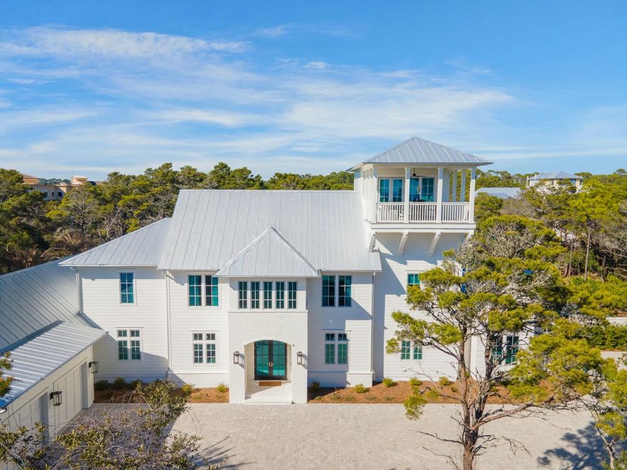 Presenting 40 Whispering Wind Way - a newly constructed, custom-designed retreat that epitomizes the highest standard of privacy, seclusion, and luxury. Nestled within the exclusive gated enclave of Bannerman Beach, this extraordinary estate offers unmatched access to a pristine stretch of North Florida coastline. With 3.4 acres of private deeded beach access and only 19 boutique lots in this serene community, this property ensures an unparalleled level of exclusivity. Adjacent to the peaceful Grayton Beach State Park, the location along the coveted 30A corridor offers both natural beauty and a quiet, tranquil atmosphere.The property boasts exceptional features such as a private pickleball court, a heated pool with a spacious pool deck, and sweeping Gulf views from the third-floor tower. The home's architecture is a true masterpiece, with reclaimed wood beam accents and artisan-sourced brickwork. A rare gem on 30A, this estate has it's very own private pickleball court.

Spanning 6,347 square feet, this expansive residence features 6 bedrooms and 6.5 bathrooms. The thoughtfully designed layout offers an ideal balance of relaxation and entertainment spaces, complemented by an elevator for easy access. The first floor includes dual primary suites for added comfort, as well as a gourmet kitchen and outdoor kitchen ideal for entertaining and hosting friends and family.  

The third-floor viewing deck is the perfect vantage point to take in breathtaking Gulf views and the stunning natural landscape. Outside, the private heated pool and expansive pool deck provide ample space for entertainment, while the exclusive 3.4-acre beach access offers residents a secluded and serene beach experience.

Bannerman Beach is renowned for its privacy and exclusivity, offering an exceptional opportunity to experience life on 30A without the distractions of short-term rentals. With a minimum of half an acre per lot, this low-density community offers the perfect environment for those seeking a secure and upscale retreat. Ideally located near both Grayton Beach and Seaside, this estate is the epitome of luxurious coastal living with the ultimate in privacy and tranquility.