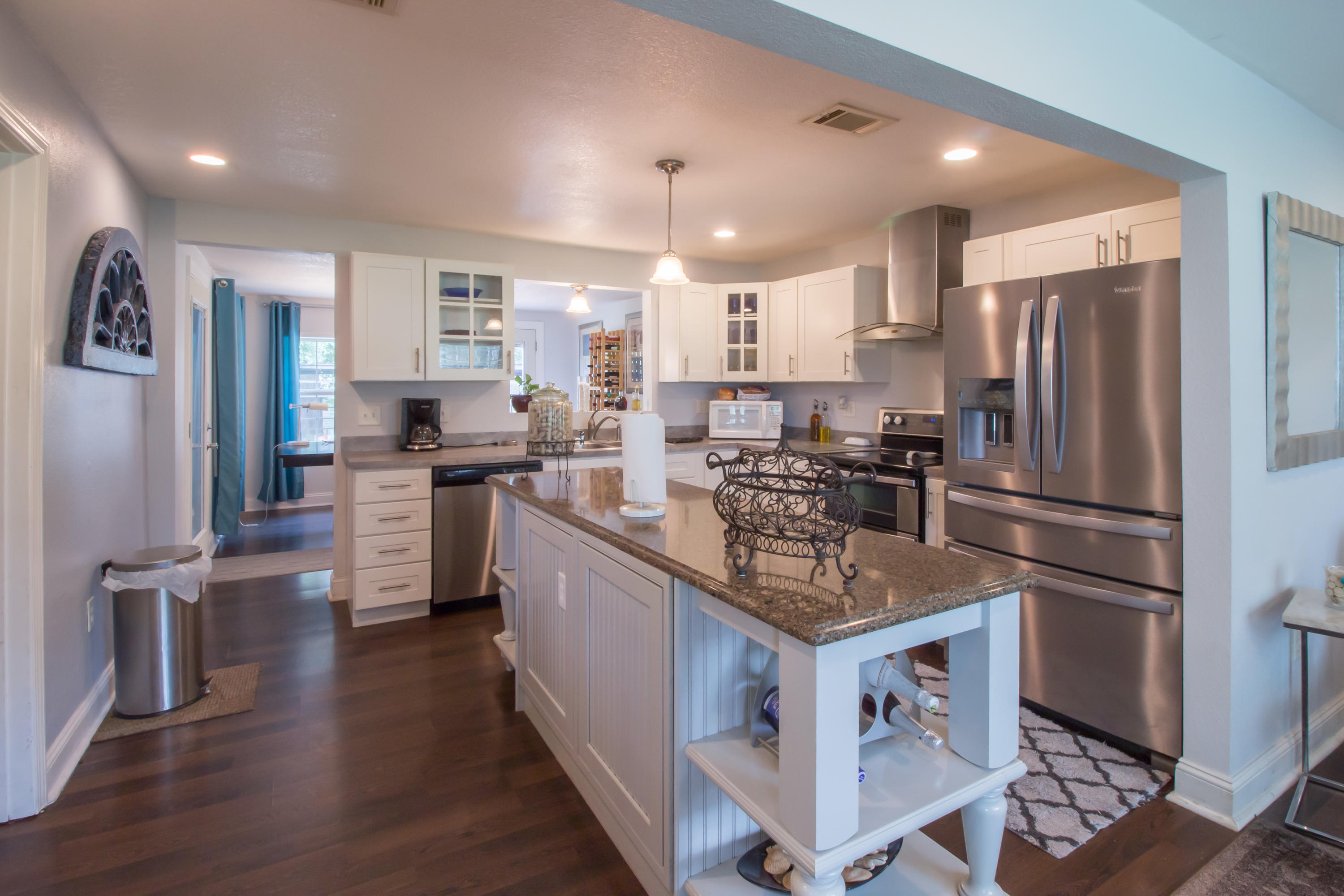 Captivating single family home minutes away from the city of Crestview with over .5 acres of land sitting on a cornet lot. This remodeled home offers stainless steel appliances, granite countertop kitchen island, beautiful bathrooms with jetted tubs and a spacious laundry room with a granite counter top. The Master bedroom features an upgraded electric fireplace, living room offers tons of natural lighting with another stackstone fireplace. The open floor layout and beautiful landscape lets you enjoy a relaxing afternoon in a jacuzzi with a fenced backyard. Comes with new Hvac, roof, washer and dryer. Seller is willing to cover home warranty and half of closing cost.