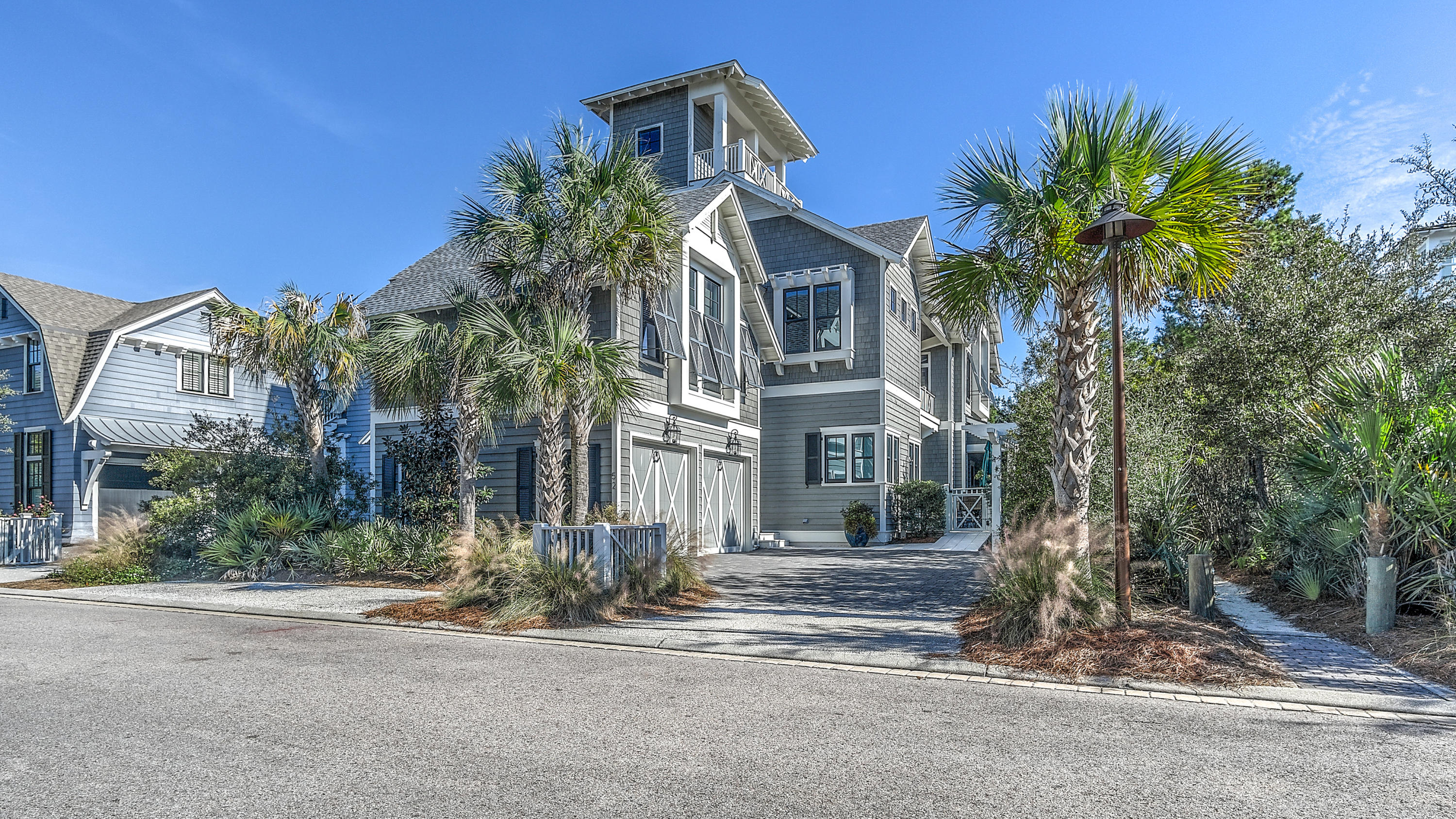 You will understand the treasure chest of wonderful beach living that this home has to offer as soon as you walk through the front door. The understated elegance is felt as soon as you enter and extends about the entire home. The inviting, main level draws you into this pristine residence with large, open, bright spaces. Enjoy grand scale entertaining in the large great room with walls of elegant windows & doors, opening to the pool deck and allowing abundant natural light and gulf breezes to flow easily throughout.The magnificent master bedroom suite has a large walk in closet, double vanities, a beautiful over sized walk in shower and separate bath. The homes guest suites provide a getaway for family and friends alike, with ample space to relax after a day of tennis or at the beach