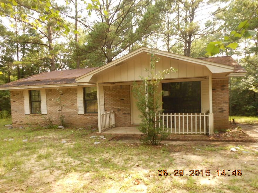 Good starter home in country setting. Three bedroom brick home on one acre fronting paved road in Ponce de Leon school district. Home has central heat/air, kitchen with small dining area, and all bedrooms are on one side of home. Detached shed. Back deck.Call today for showing.