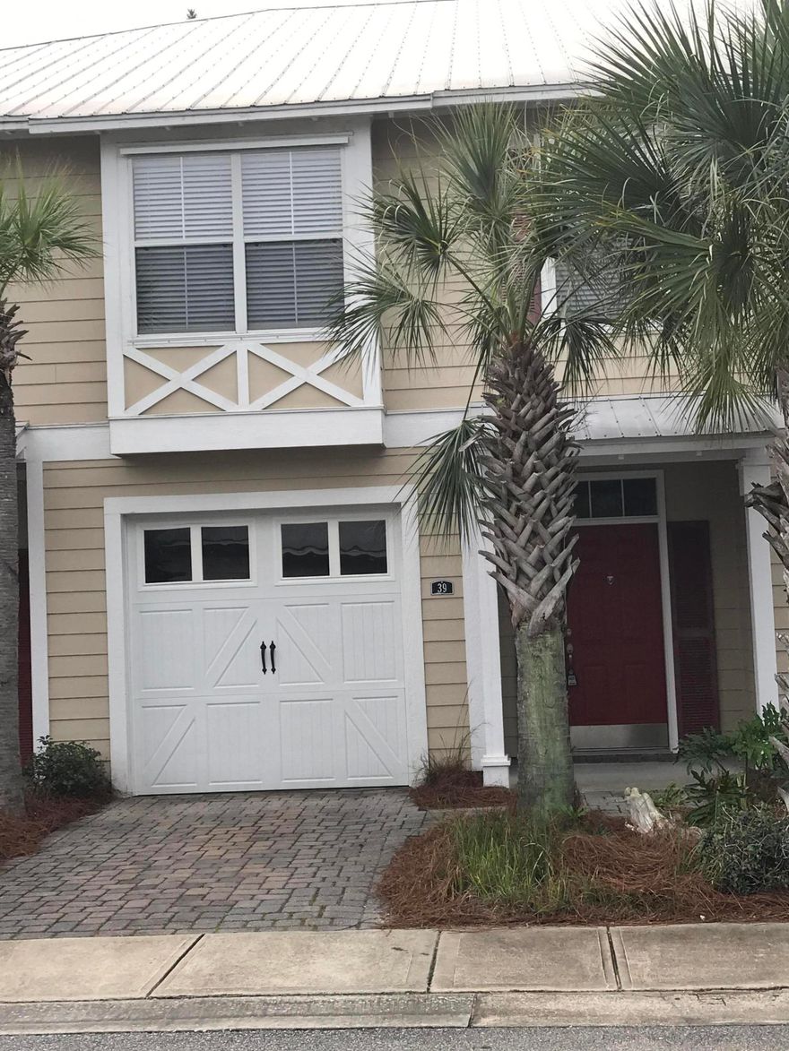 Spacious townhouse with a single car garage and brand new carpet located in Eagle Bay! Lovely 3 bedroom, 2.5 bath unit features tile floors downstairs and carpeting upstairs except for wet areas. Kitchen offers stainless appliances and granite countertops and a built in wine rack. There is a nice size covered patio that overlooks a green area....great for relaxing after a long day. Just minutes to shopping, dining, and beaches of South Walton!