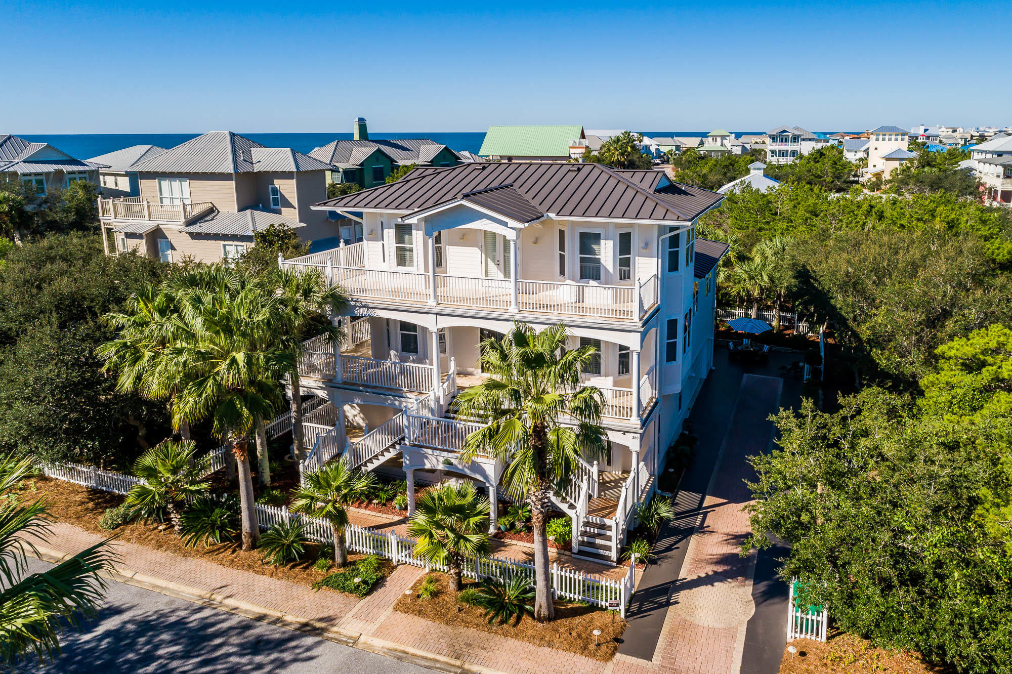 This elegant contemporary coastal home is prominently situated south of 30A in the private, gated community of Old Florida Beach, a Gulf-front community which also fronts the coastal dune lake of Draper Lake. The luxury residence is located just steps from the beach and Draper Lake and boasts both Gulf and lake views. The quiet, gated community offers privacy, community boardwalks, three community beach walkovers and a community pool.