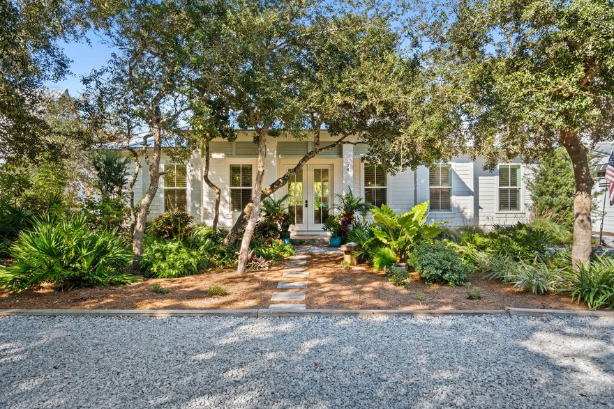 Nestled south of Hwy 30A in the heart of Old Blue Mountain Beach, this stunning custom-built residence features three spacious bedrooms and three well-appointed bathrooms, thoughtfully designed for comfort and convenience. Engineered hardwood floors flow seamlessly throughout the home, adding warmth and elegance to every room.Enjoy a mere 4-minute walk to a neighborhood deeded beach access, along with two additional access points, making it easy to bask in the sun, sand, and surf at your leisure.The home offers ample parking for you and your guests. With the oversized lot, there's exciting potential to add a garage and carriage house, enhancing both functionality and value.Step outside to discover a lush, private landscape yard that serves as a serene retreat.  The outdoor space is an entertainer's paradise, featuring a beautiful private pool, an inviting outdoor fireplace, and a convenient outdoor shower, perfect for rinsing off after a day at the beach.

Inside, you'll appreciate the convenience of two laundry rooms, making laundry day effortless. The heart of the home is the custom kitchen, equipped with quality cabinetry that combines style and functionalityideal for any culinary enthusiast.

This property is not just a home; it's the perfect full-time residence, second home, or rental opportunitythe possibilities are endless! Experience the perfect blend of luxury and practicality in this custom-built home, where every detail has been meticulously considered. Don't miss out on this exceptional opportunity!