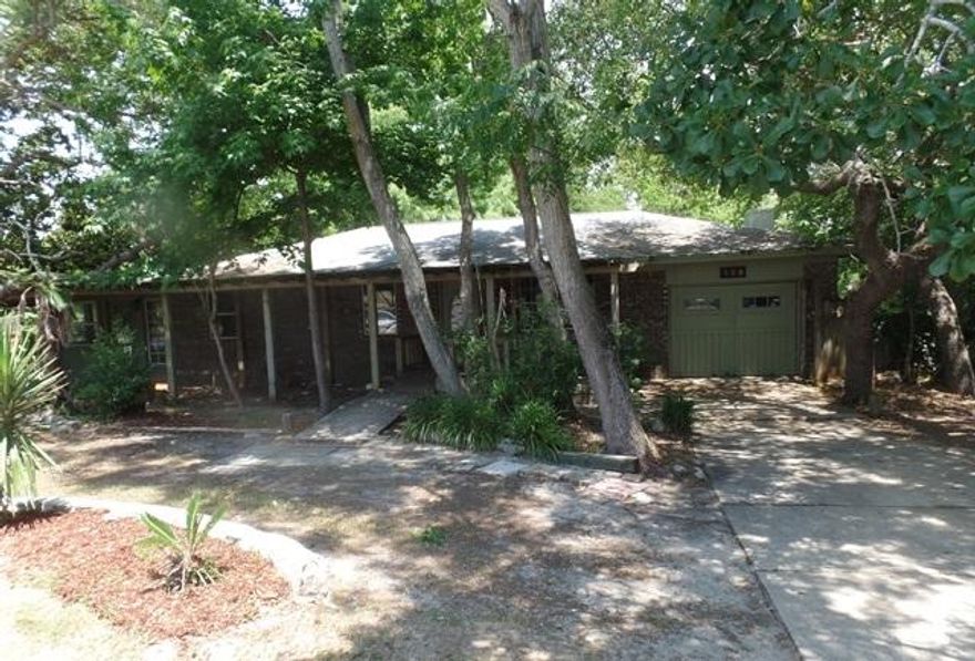 REO ~ Lots of Potential centrally located in West Destin. This 3 Bd / 2 Ba home is just a few blocks to the elementary school & within a mile of the Harbor & entertainment. This is a Fannie Mae HomePath Property!
