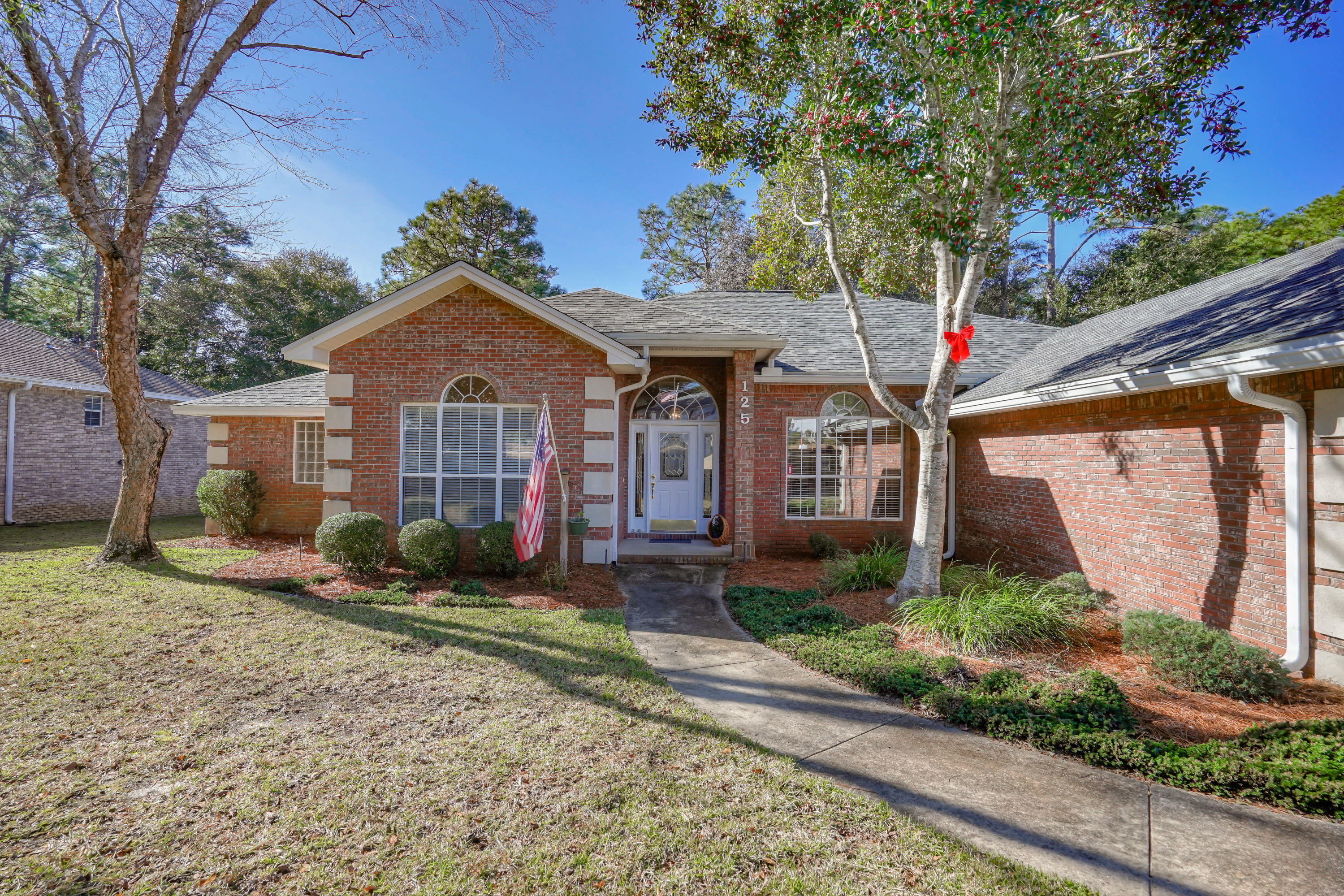 Extremely well maintained home in the much desired Rocky Bayou Estates on a half acre lot. This home has a very spacious living room that opens into the kitchen and dining area, 4 bedrooms plus a study and two full baths. Enjoy summer nights on the lovely screened in porch overlooking the large private back yard. You can have peace of mind with a two year old roof and a new hot water heater that is being installed. The master suite has double vanities, garden tub and separate shower as well as two walk-in closets. This beautiful neighborhood has sidewalks and is walking distance to Publix, Panera, shops and many other restaurants. Quick commute to Eglin, Hurlburt or Duke Field and in an A rated school zone. Call today to see this well appointed home.