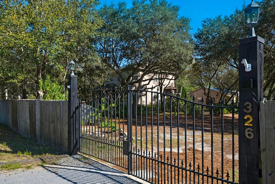 Located 1/4 mile to the Bay with a public boat launch and one mile to the beach. Perfect location to settle down. Near hospital, schools,entertainment, and restaurants. Highest point in the area. Property is .57 of an Acre and is zoned for 2 homes. Driveway has a security gate and property is fully fenced in with a privacy fence. This lot is large enough to park your RV, boats or work equipment. The possibilities are endless. There is a public boat ramp at the end of E. Hewitt Drive. Lot sits in Flood Zone X and flood insurance is available. There are various fruit trees on the land, ie.. Grapevines, banana trees, citrus trees, and other fruit trees. There is plenty of room to live off the land and grow your own vegetables.