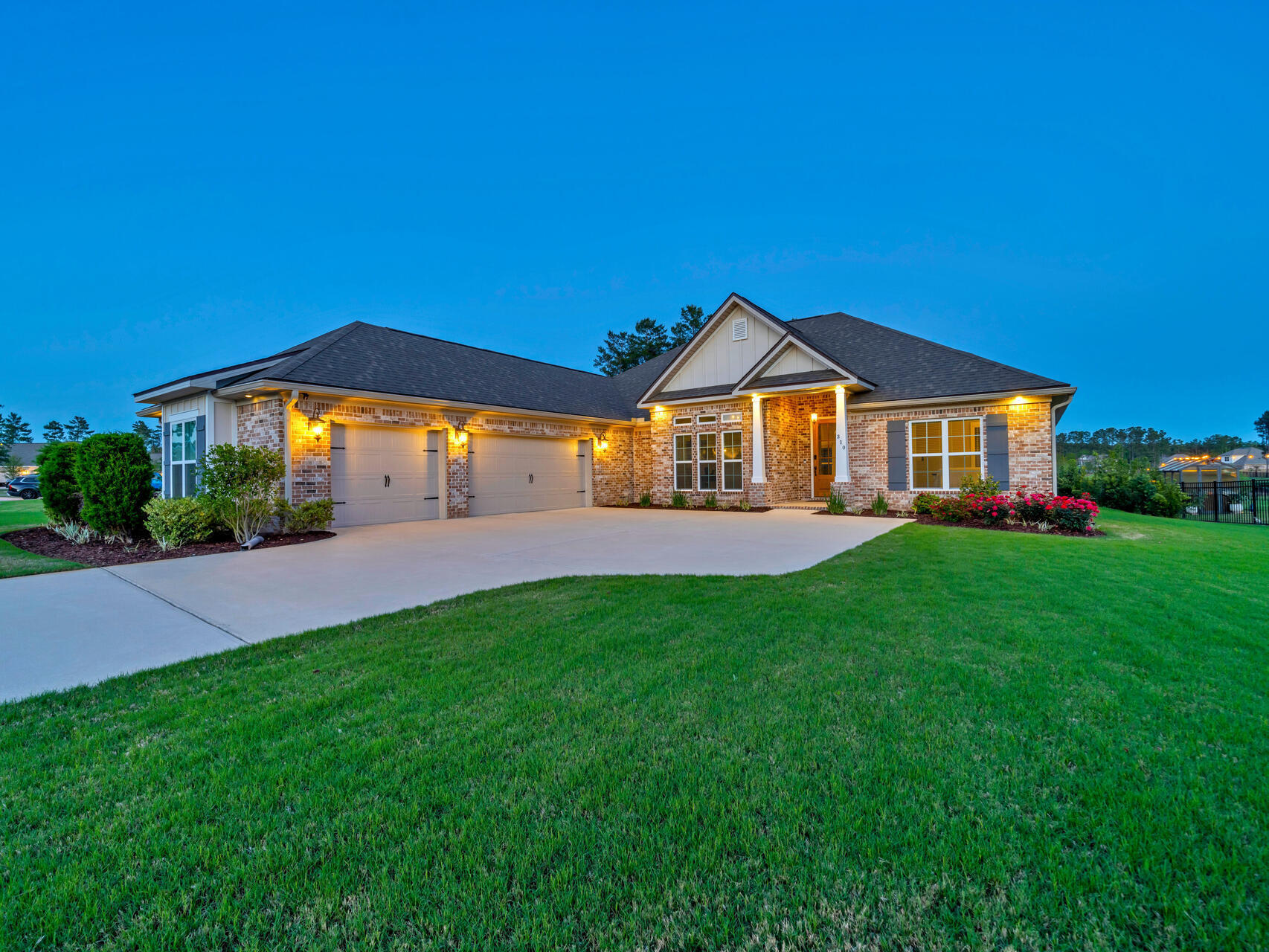 Welcome to The Richmond Two, an exquisite poolside home in the heart of Hammock Bay, a vibrant community known for its spectacular events, trails, pools, playgrounds, and more. This beautifully crafted Truland home sits on a private half-acre wooded lot with serene pond views, perfect for sunrises and sunsets. Inside, enjoy upgraded hardwood floors, an open floor plan, a gas fireplace, quartz countertops, frameless showers, Rinnai tankless water heater, and a Flex/Bonus Room with vaulted ceilings and tons of light. With 4 bedrooms, 3 full baths, enclosed 7-foot pool, outdoor shower, and a 3-car garage, this home offers ample space and storage. Don't miss this opportunity to own one of the best waterfront views in Hammock Bay