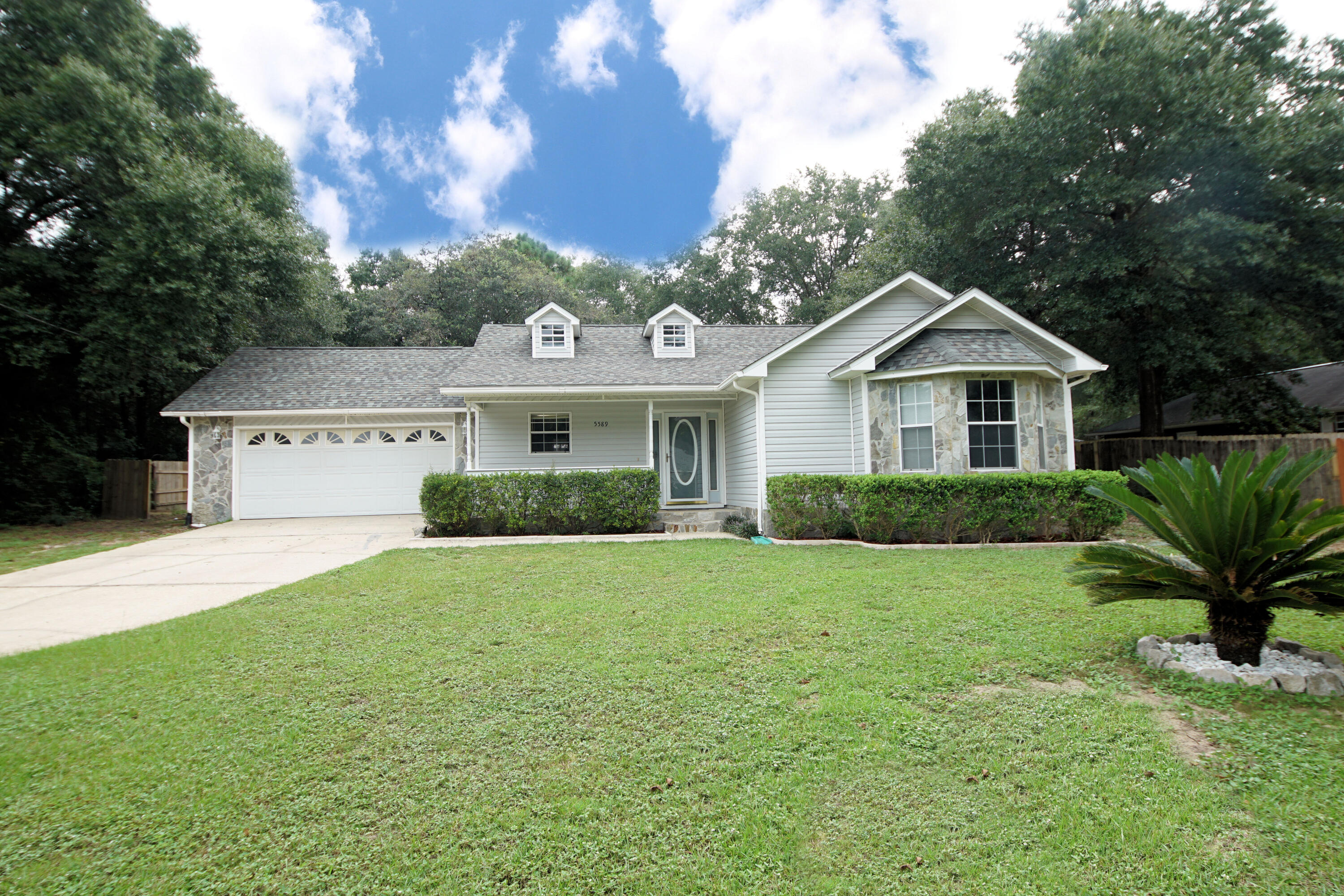 Back on Market !  Buyer financing fell through!  Nestled on a Cul De Sac this homey 3-bedroom home has the convenience of nearby shopping and restaurants and the privacy of a small estate.  Home features newer vinyl plank flooring and carpet. Roof 2015, AC 2017 Large sunroom with hot tub (As IS). Large, fenced back yard