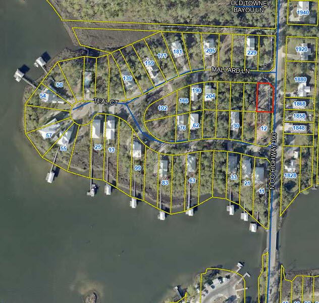 This lot is priced low to move quickly.  The seller has another opportunity that he doesn't want to lose so ''quick to close'' would be appreciated.    Cessna Landing is a charming subdivision with covenants and restrictions in place designed to keep good neighbors.  The lot has already been cleared and prepped for construction so you can walk the lot to get a feel for where you want your new home located. The corner lot is also approximately 11 feet larger than most lots in the subdivision which is most appealing.      Zoning is AE which is the 100-year flood plain.  Homes are built on pilings in this subdivision with parking and storage below. The gated subdivision features a community pool, is governed by an architectural review board to ensure a harmonious composition of quality homes, has lovely common area landscaping and irrigation, boasts underground utilities that are safer during storms and aesthetically pleasing, as well, and is conveniently located for quick access to the public boat launch and fishing pier.  The seller was planning to build and even has a set a plans ready to go if the buyer is interested.  We need to move this lot as quickly as possible.  If you're looking for a place to build at a great price, you got lucky today.  