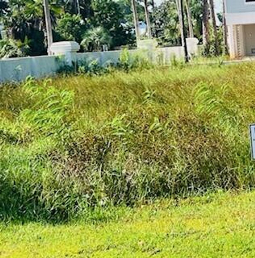 This lot is priced low to move quickly.  The seller has another opportunity that he doesn't want to lose so ''quick to close'' would be appreciated.    Cessna Landing is a charming subdivision with covenants and restrictions in place designed to keep good neighbors.  The lot has already been cleared and prepped for construction so you can walk the lot to get a feel for where you want your new home located. The corner lot is also approximately 11 feet larger than most lots in the subdivision which is most appealing.      Zoning is AE which is the 100-year flood plain.  Homes are built on pilings in this subdivision with parking and storage below. The gated subdivision features a community pool, is governed by an architectural review board to ensure a harmonious composition of quality homes, has lovely common area landscaping and irrigation, boasts underground utilities that are safer during storms and aesthetically pleasing, as well, and is conveniently located for quick access to the public boat launch and fishing pier.  The seller was planning to build, but his plans have changed.  We need to move this lot as quickly as possible.  If you're looking for a place to build at a great price, you got lucky today.  