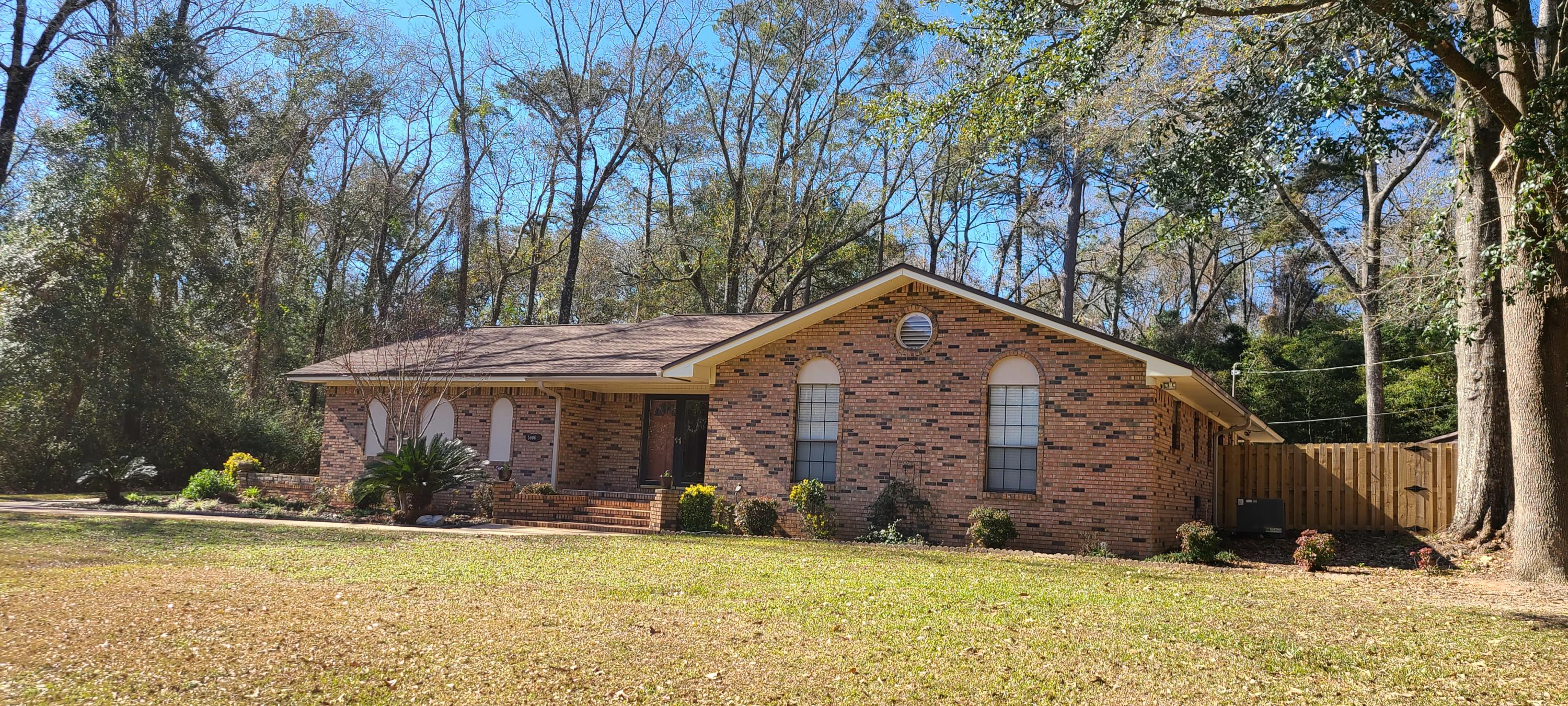 Take a look at this Exceptionally well kept home with 3 bedroom 2.5 baths sitting on a 1/2 ac and so much to offer. Grand entry way into a large family room with Cathedral ceilings, crown molding and lots of can lighting. Beautiful wood burning fireplace that has recently been certified and a lock top damper was added. Gorgeous hand carved Cypress Mantel above fireplace. The Family room has surround sound already installed and a Bose system is being left for new owners. Large master bedroom has new carpet, Viewsonic projector system with a 105' pull-down screen, master bath has a walk in tiled shower and a 10 x 10 cedar lined walk in closet. Nice Kitchen with Hickory Wood cabinets, dual ovens and a breakfast bar, plus a formal dining area. Also has an area for a stand up freezer.