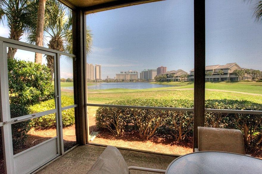 Lovely 3/3 flat on the lake and golf course at Seascape. Crown molding with 10 foot ceilings and all new flooring throughout. New granite counter tops and new stainless steel appliances. Master bath has Whirlpool tub and separate shower with a large walk in closet. Master bedroom and living room have french doors that open onto double screened porches overlooking the lake and golf course. Entire unit has been completely re-painted and property has never been rented.