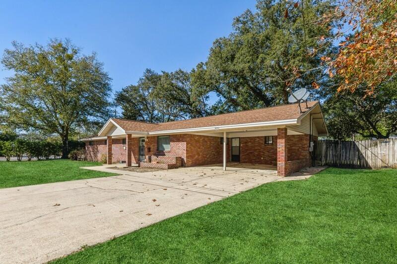 Wow, brick home with 4 bedrooms, office, & 3 full baths on a spacious .39 acre corner lot in the Heart of Niceville! Stainless Steel Samsung Kitchen appliances were installed in 2019. Eat in kitchen has lots of storage. Kitchen and bath cabinets are custom solid wood from a local cabinet maker. Front room has built-ins with locking doors & drawers. It could be used as an office or second living space. Primary and another bedroom have 2 closets. Newer laminate and tile flooring in most of the home.Newer washer & dryer with pedestals convey. Home has an ADT security system. In addition to the 1926 sq ft of living area, there is a 240 sq ft finished storage room, a 15 x 31 ft back patio and a shed. HVAC was replaced in 2019. Roof was replaced in 2011.