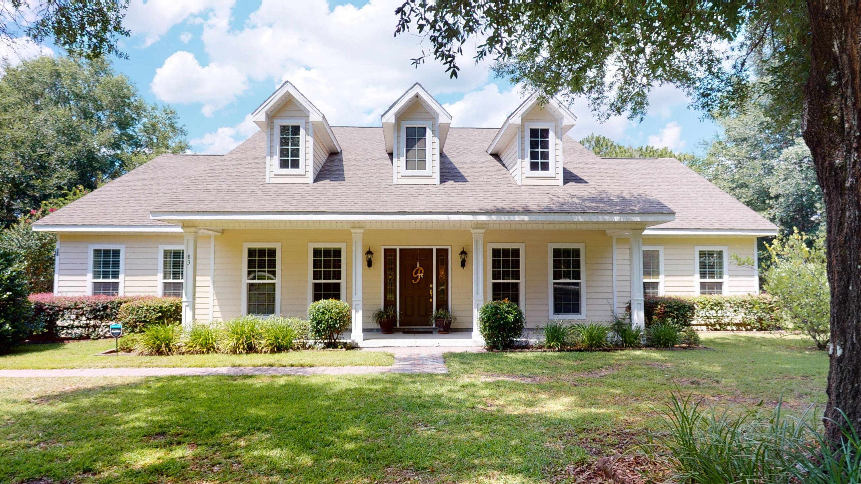 Exceptional one owner, custom built home in Spring Lake Estates. Large open lot with over 200' of lake front views. The dock, boat lift and convenient sink are perfect for your lake home adventures! This home has many great features including tile floors, marble bathtubs/showers, granite counter tops, sprinkler system (water provided free from the lake), on demand hot water and Jenn-Air double ovens! Attention to detail is evident throughout the home, the summer kitchen is a brilliant addition to an already fanatic home. Move in ready condition! A must see!